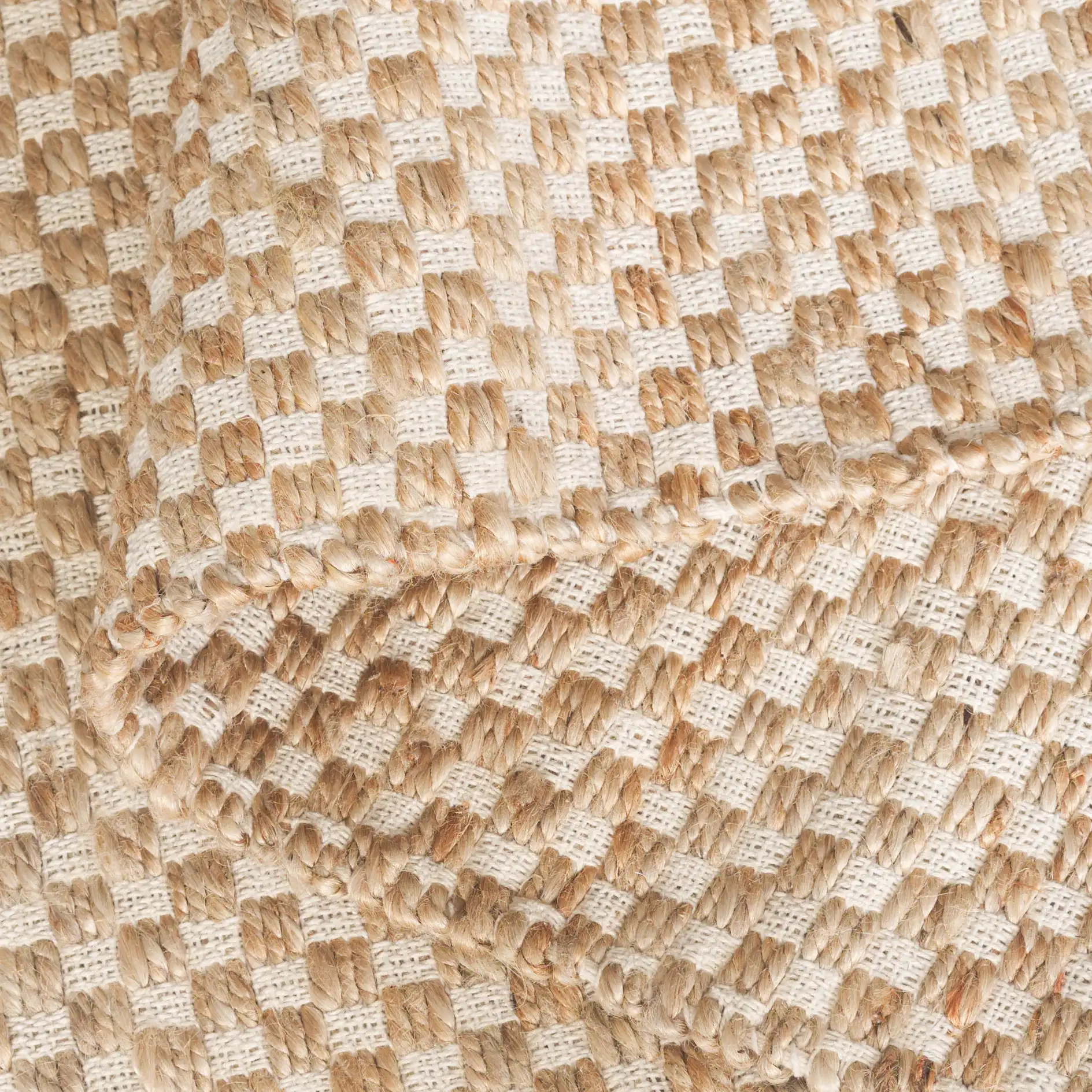 Montauk Checkered Hand-Loomed Rug in Natural / Yellow in a styled room