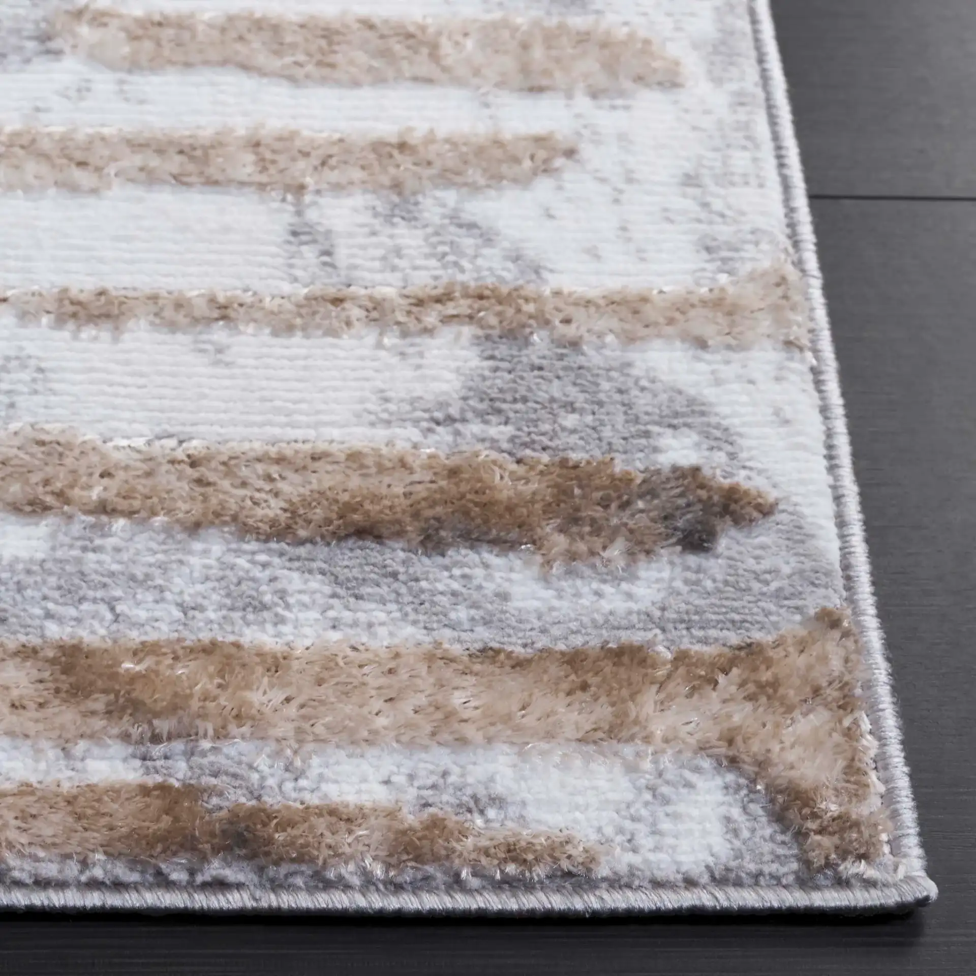 Maya Striated Abstract Rug in Ivory / Gray Beige in a styled room