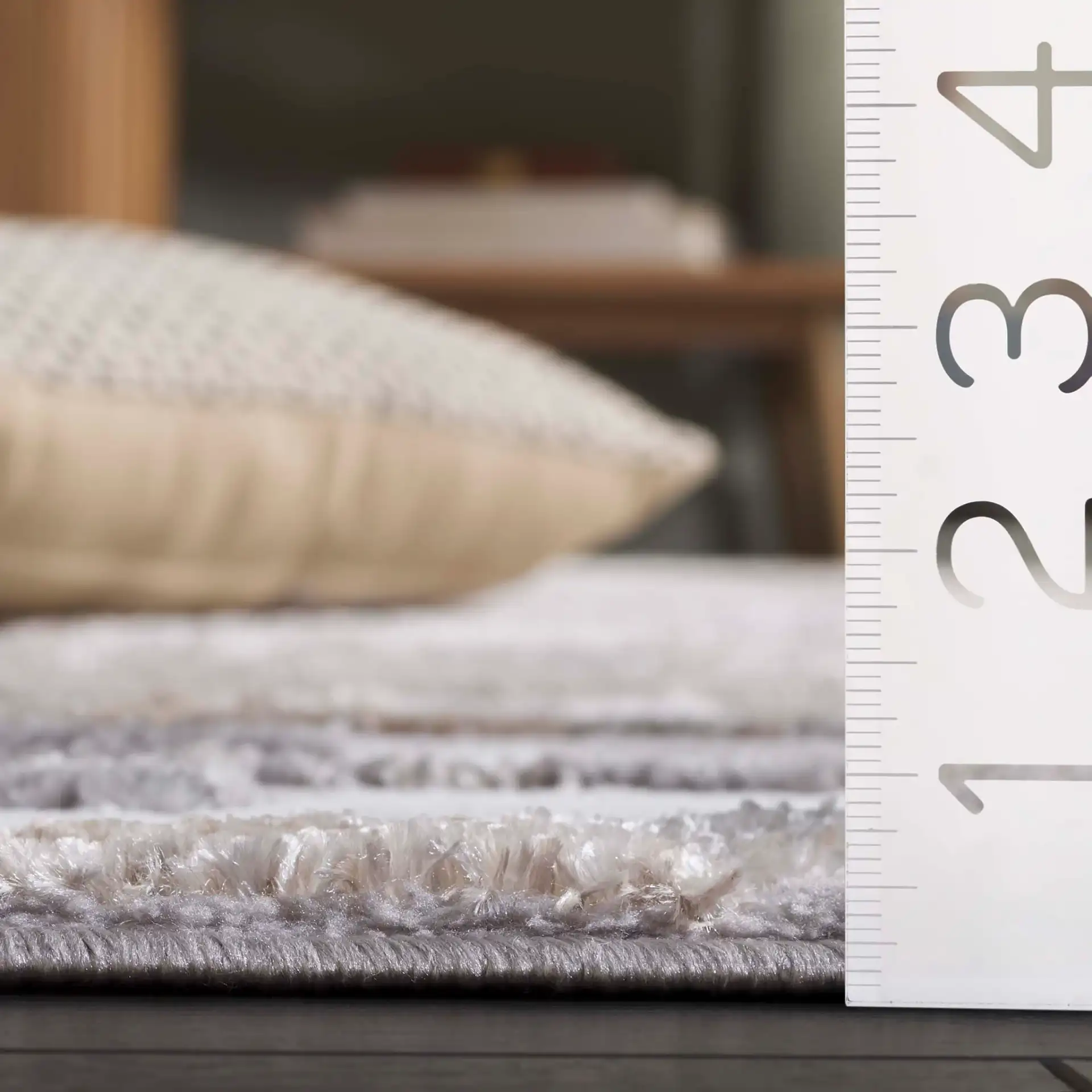 Maya Striated Abstract Rug in Ivory / Gray Beige in a styled room
