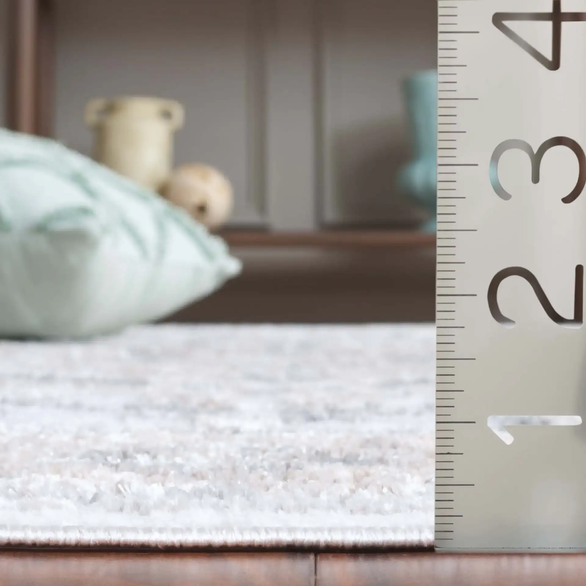 Maya Distressed Medallion Rug in Ivory / Gray Beige in a styled room