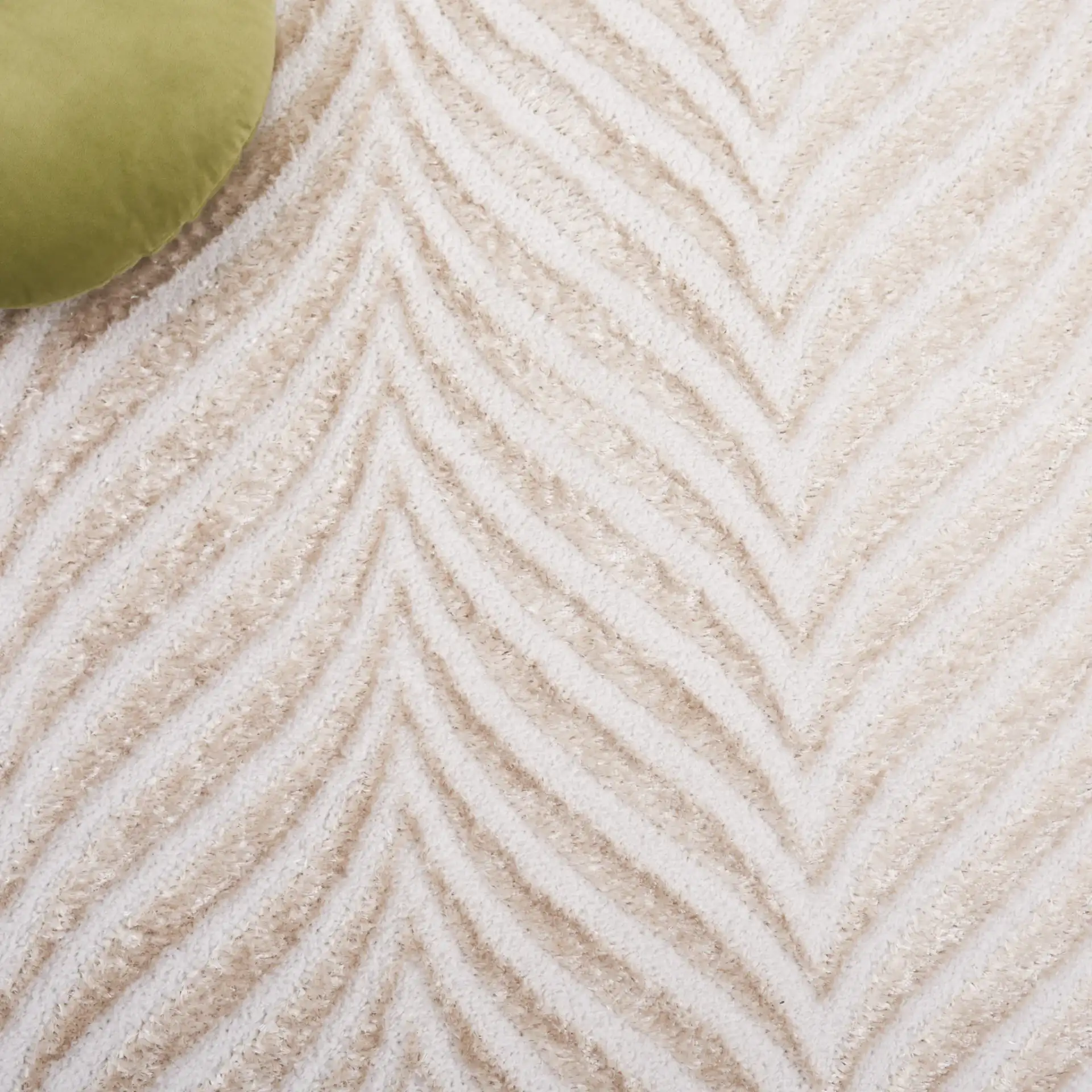 Maya Chevron Rug in Ivory / Beige in a styled room