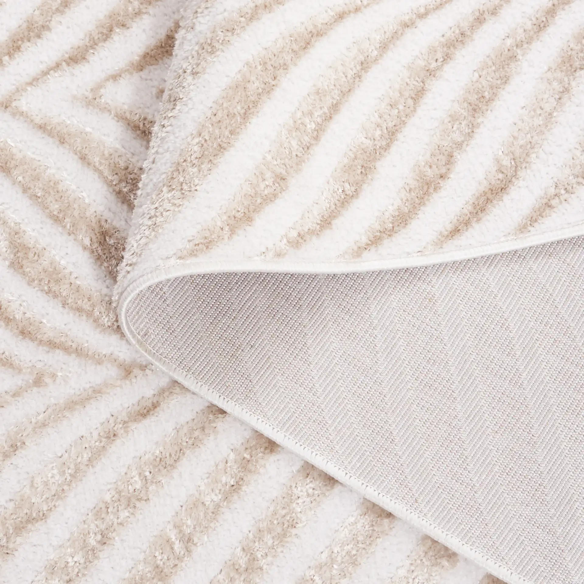 Maya Chevron Rug in Ivory / Beige in a styled room