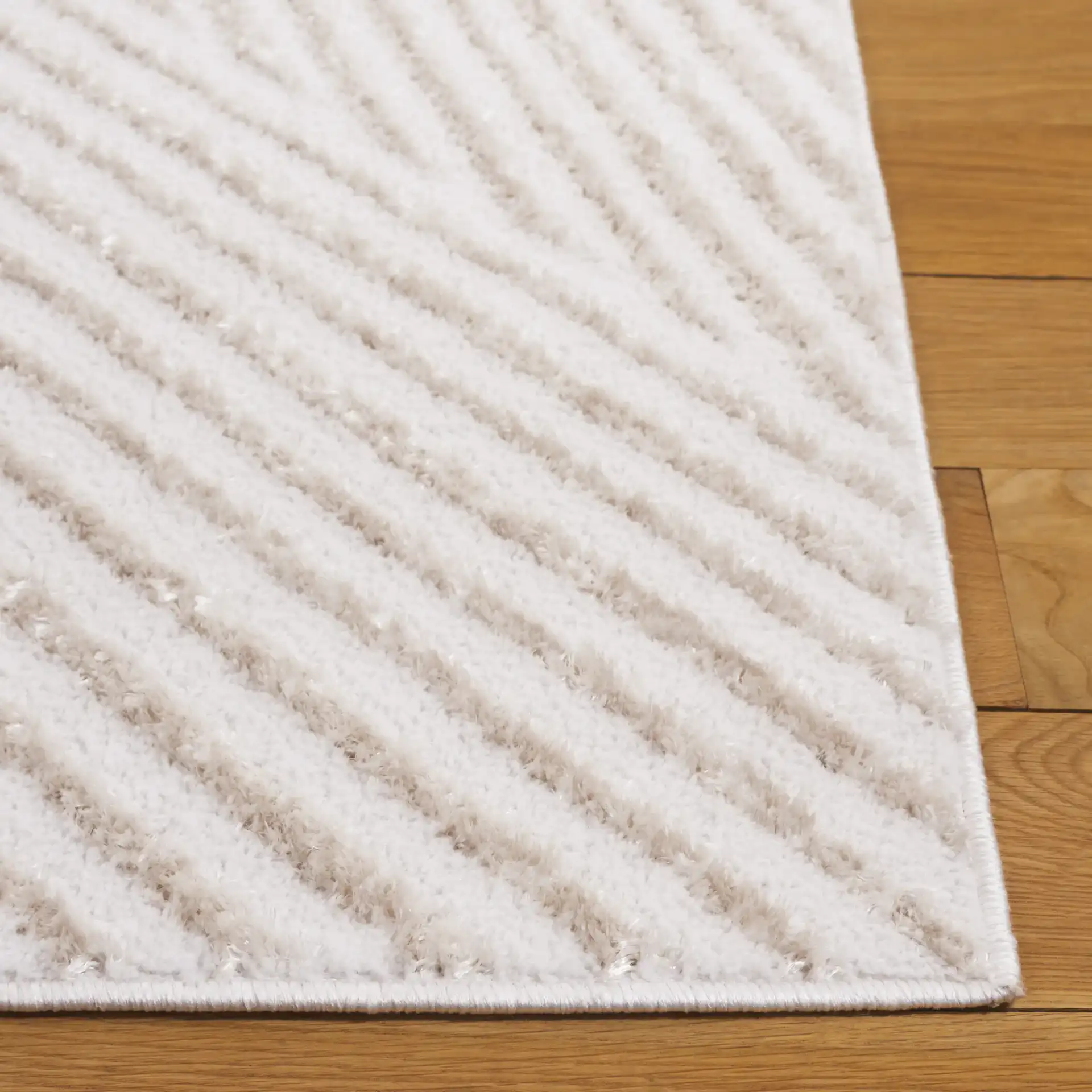 Maya Angled Stripe Rug in Ivory in a styled room