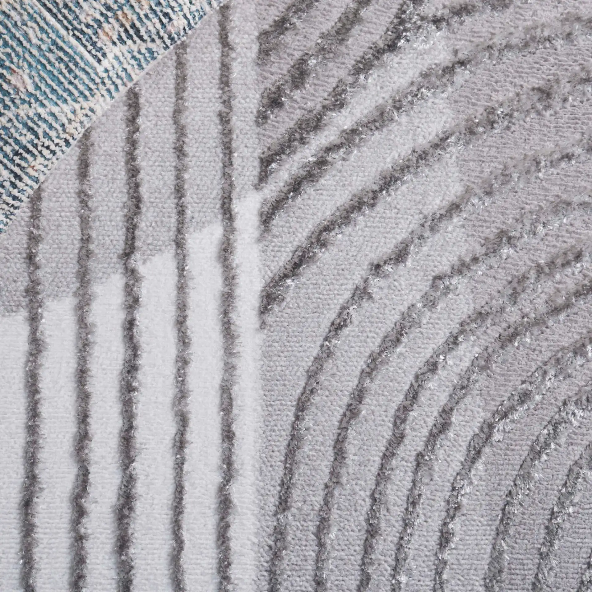 Maya Curved Stripe Rug in Ivory / Gray in a styled room