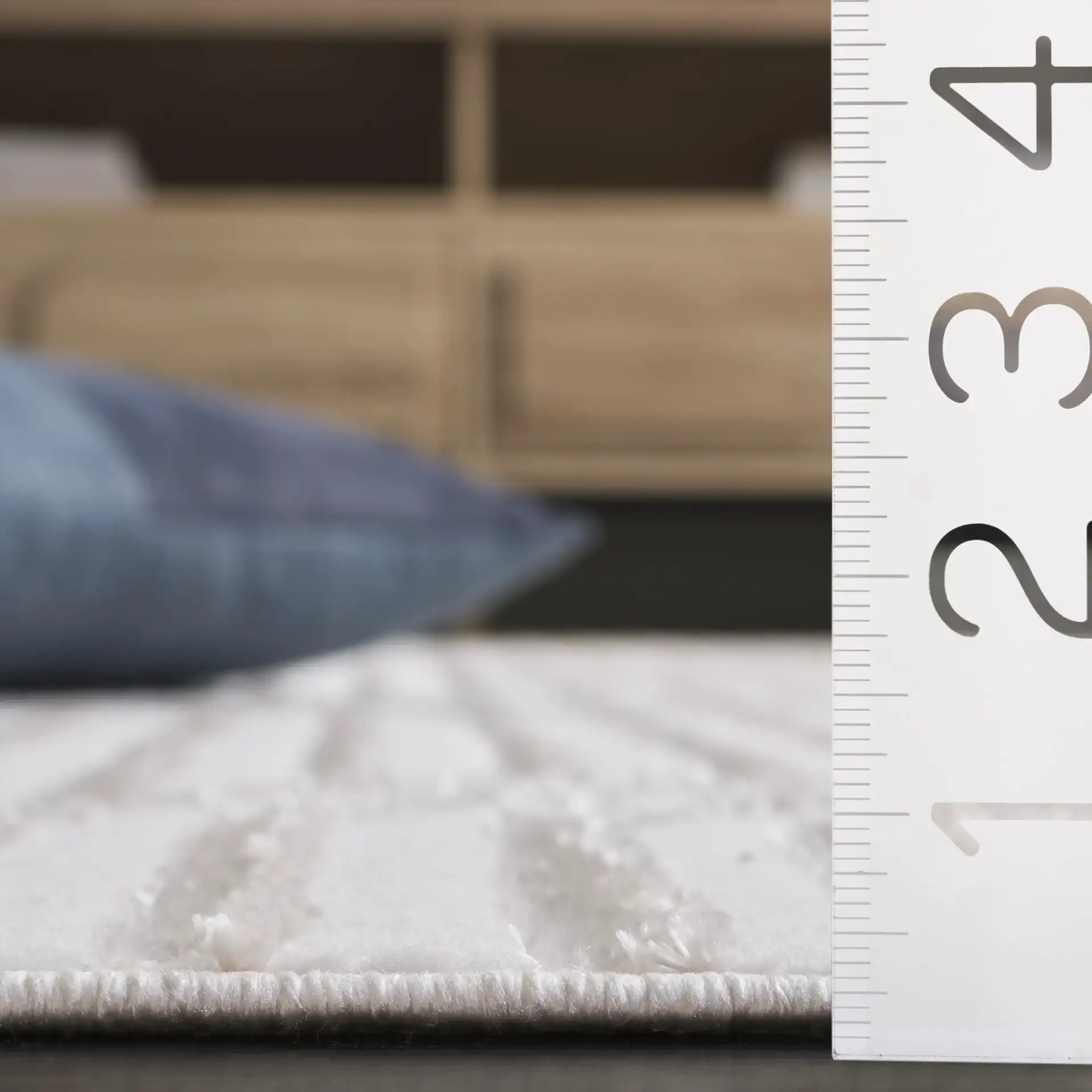 Maya Linear Arch Rug in Ivory in a styled room