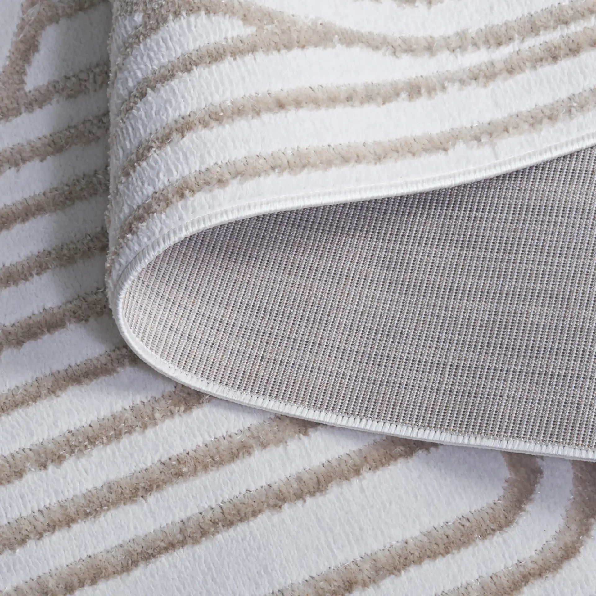 Maya Linear Arch Rug in Ivory in a styled room