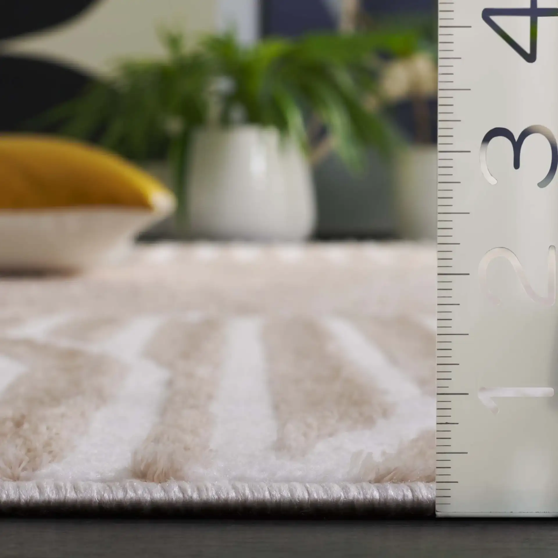 Maya Overlapping Arch Rug in Taupe / Ivory in a styled room