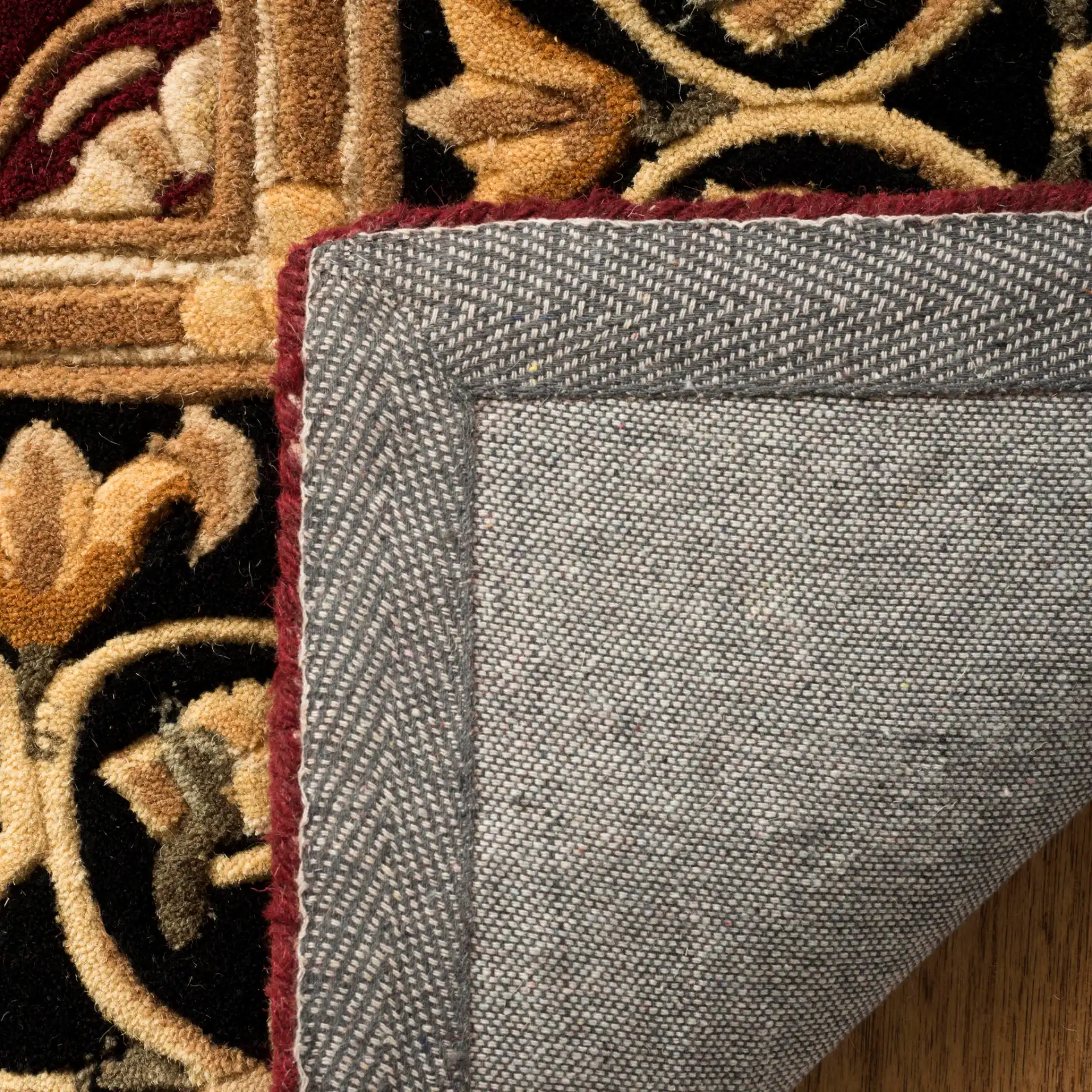Naples Floral Grid Hand-Tufted Wool Rug in Burgundy / Black in a styled room