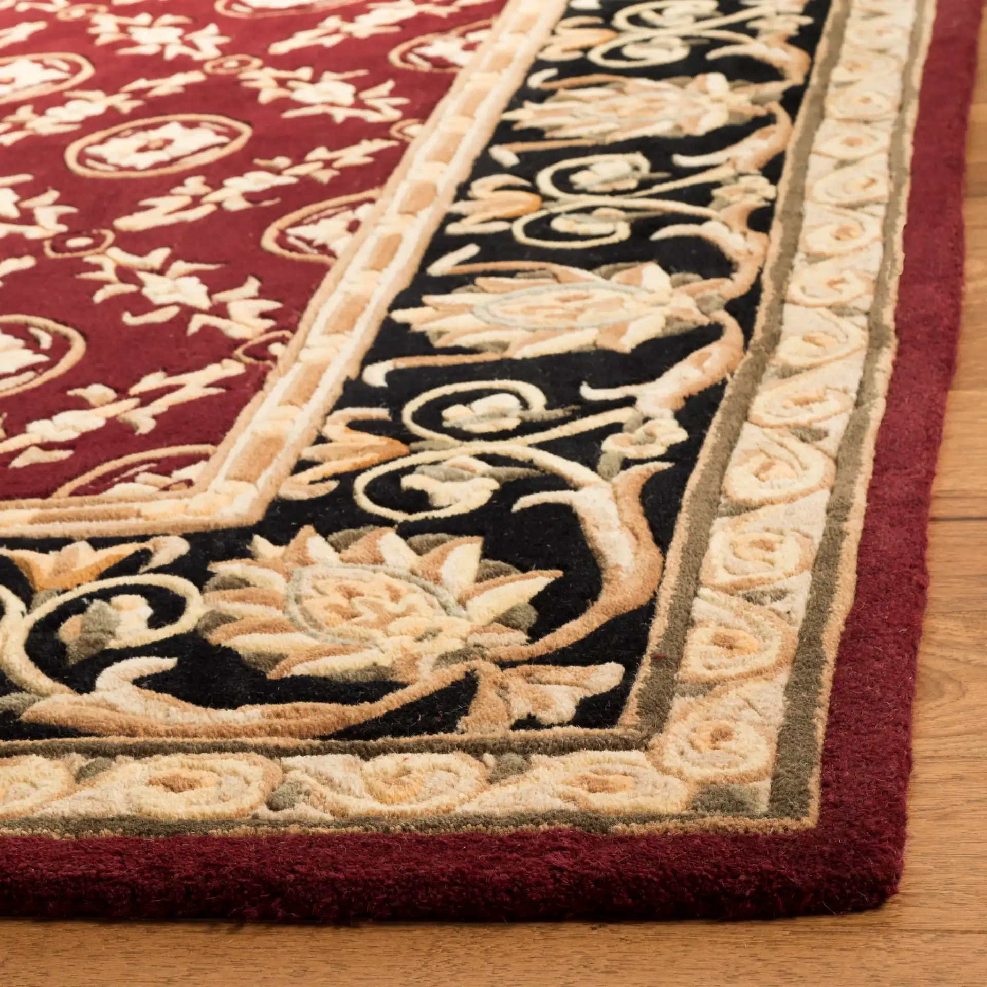 Naples Floral Grid Hand-Tufted Wool Rug in Burgundy / Black in a styled room