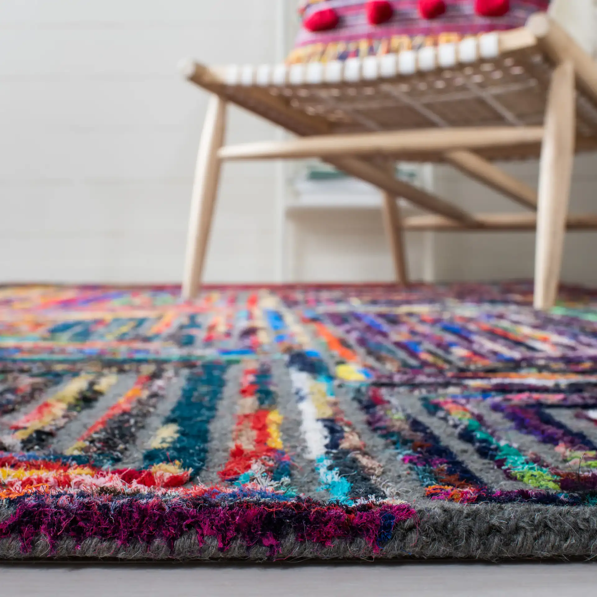 Nantucket Patchwork Blocks Hand-Tufted Rug in Charcoal in a styled room
