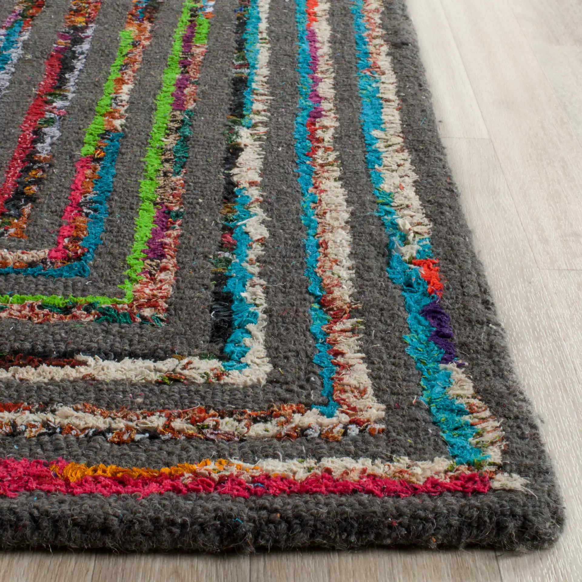 Nantucket Patchwork Blocks Hand-Tufted Rug in Charcoal in a styled room