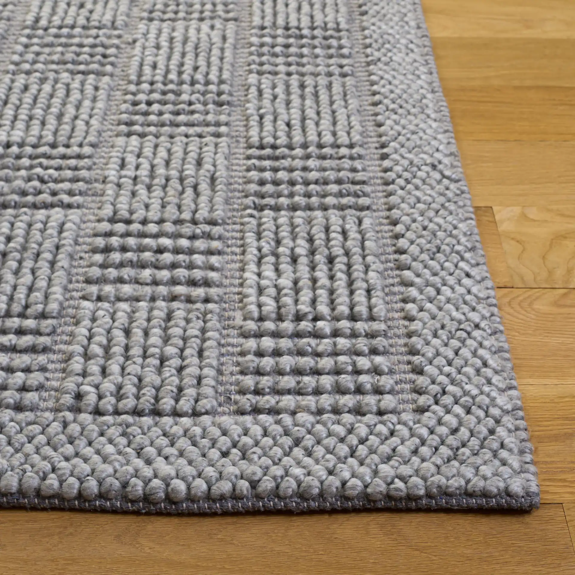 Natura Basketweave Hand-Woven Rug in Gray in a styled room