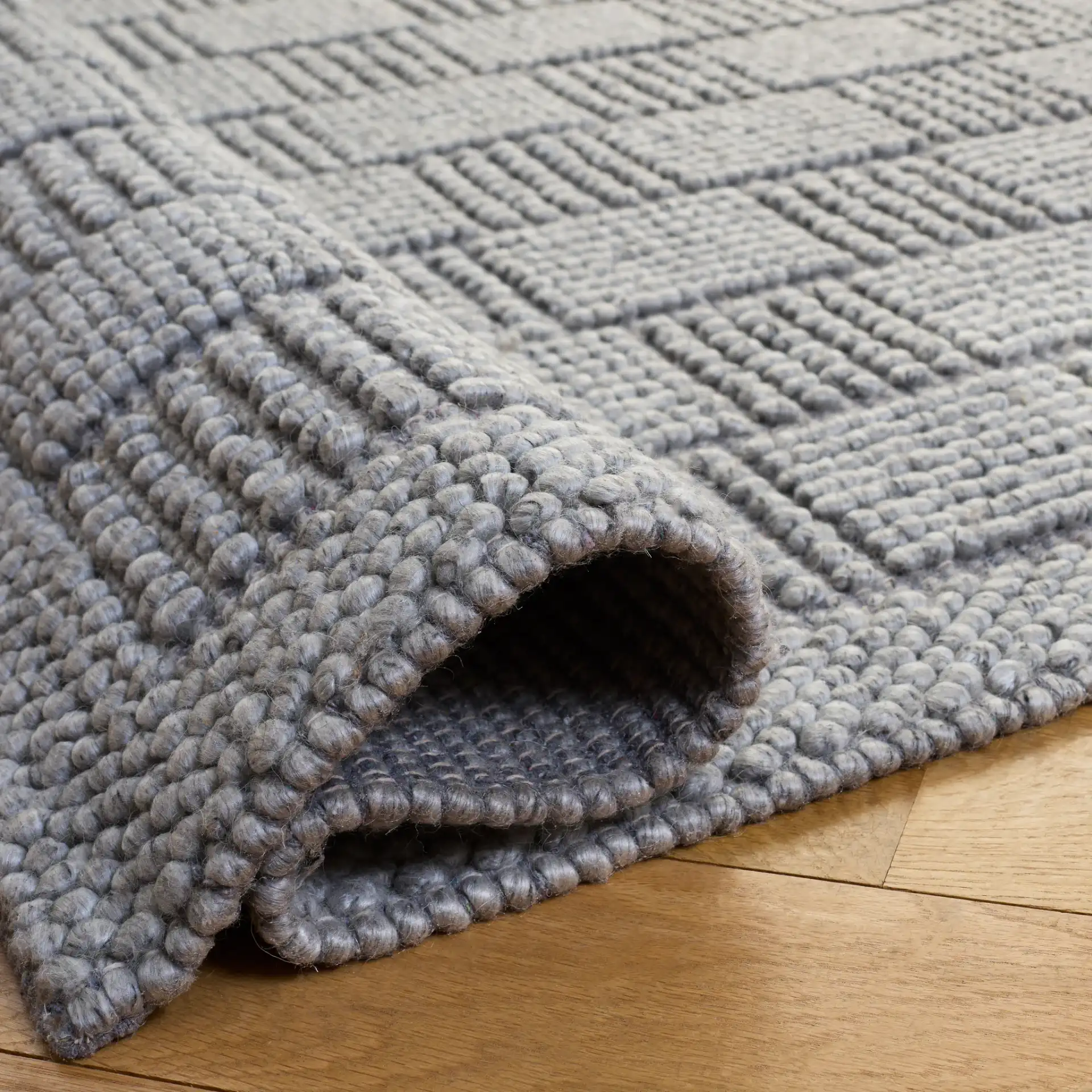 Natura Basketweave Hand-Woven Rug in Gray in a styled room