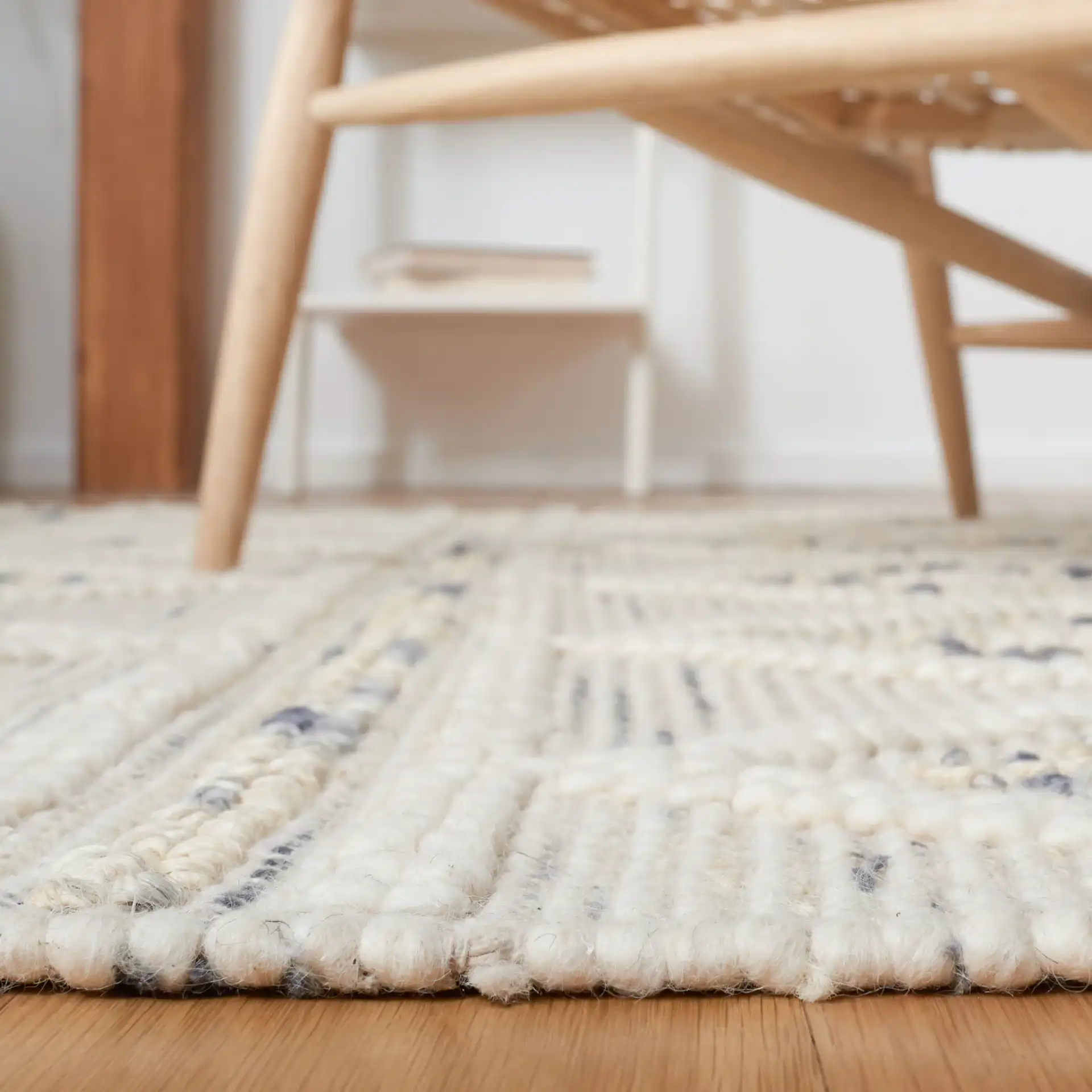 Natura Diamond Banded Hand-Loomed Rug in Ivory / Gray in a styled room