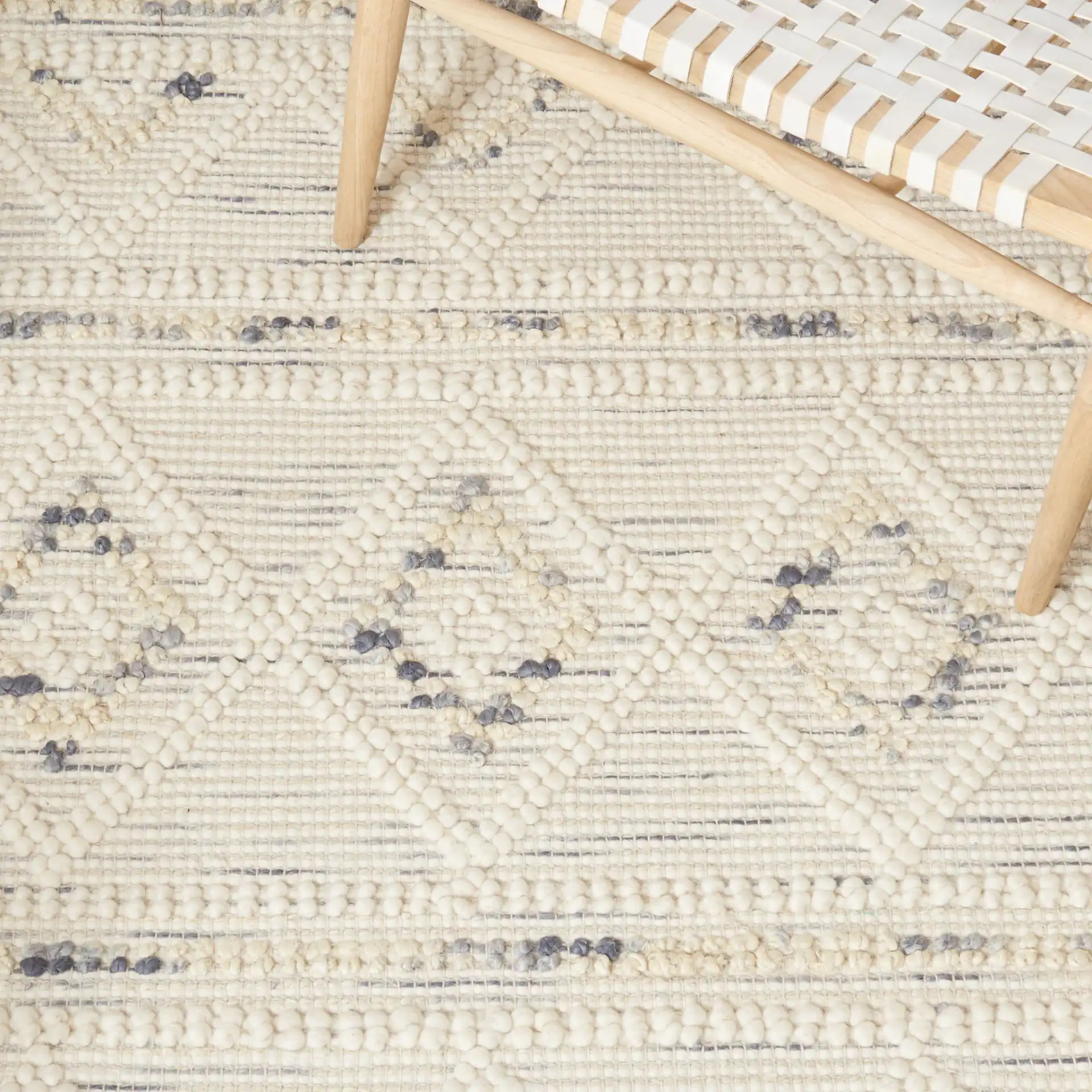 Natura Diamond Banded Hand-Loomed Rug in Ivory / Gray in a styled room
