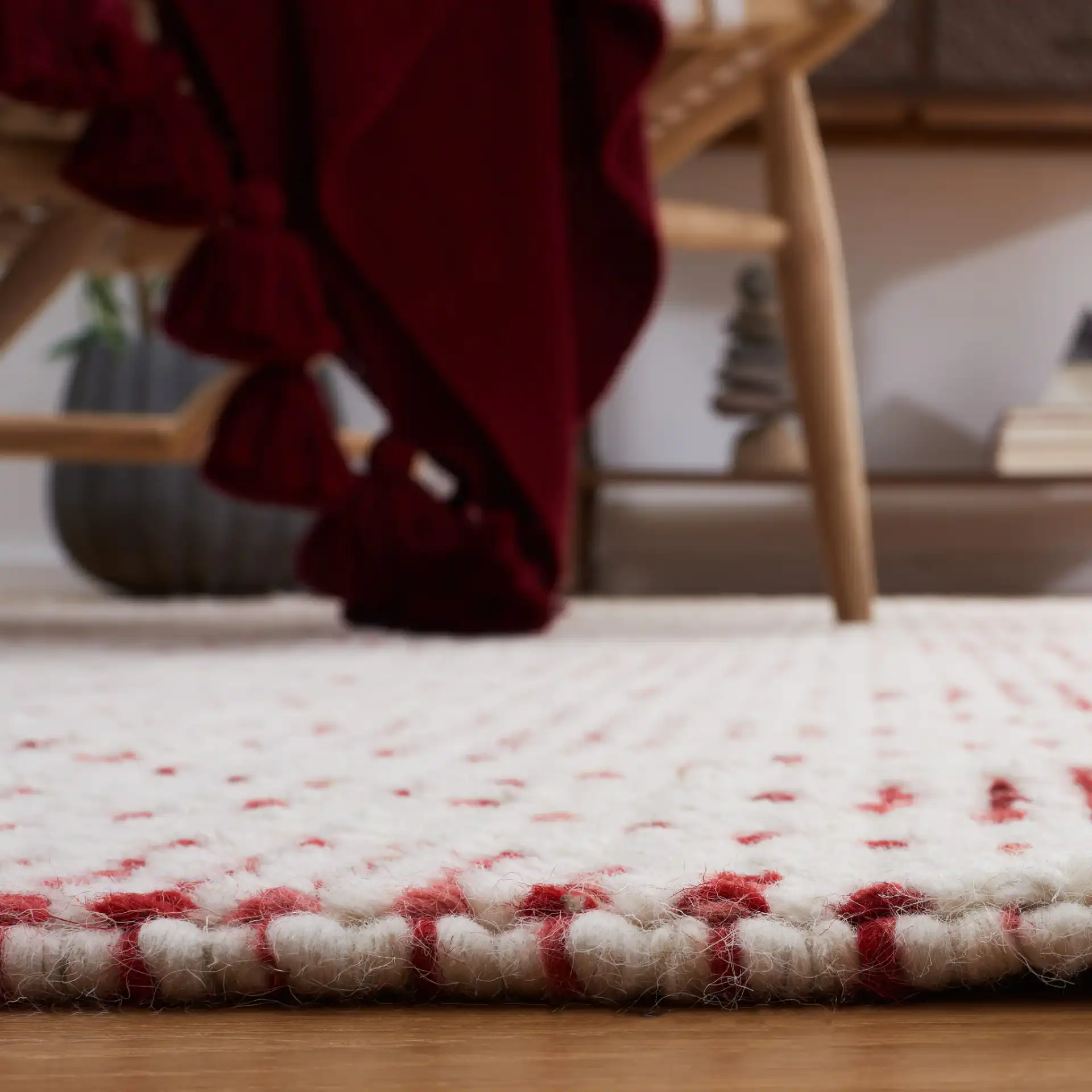 Natura Diamond Hand-Loomed Wool Rug in Ivory / Red in a styled room