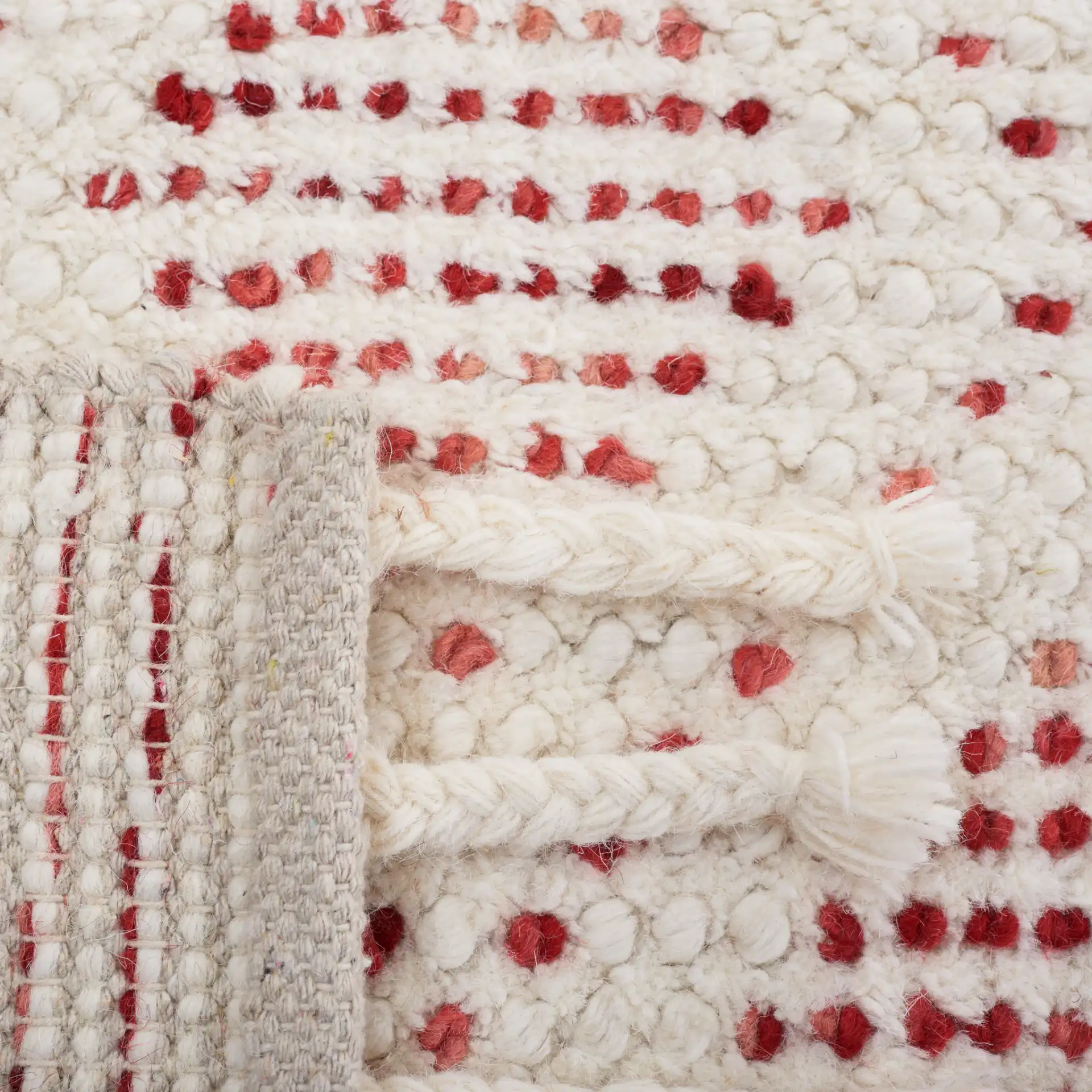 Natura Diamond Hand-Loomed Wool Rug in Ivory / Red in a styled room