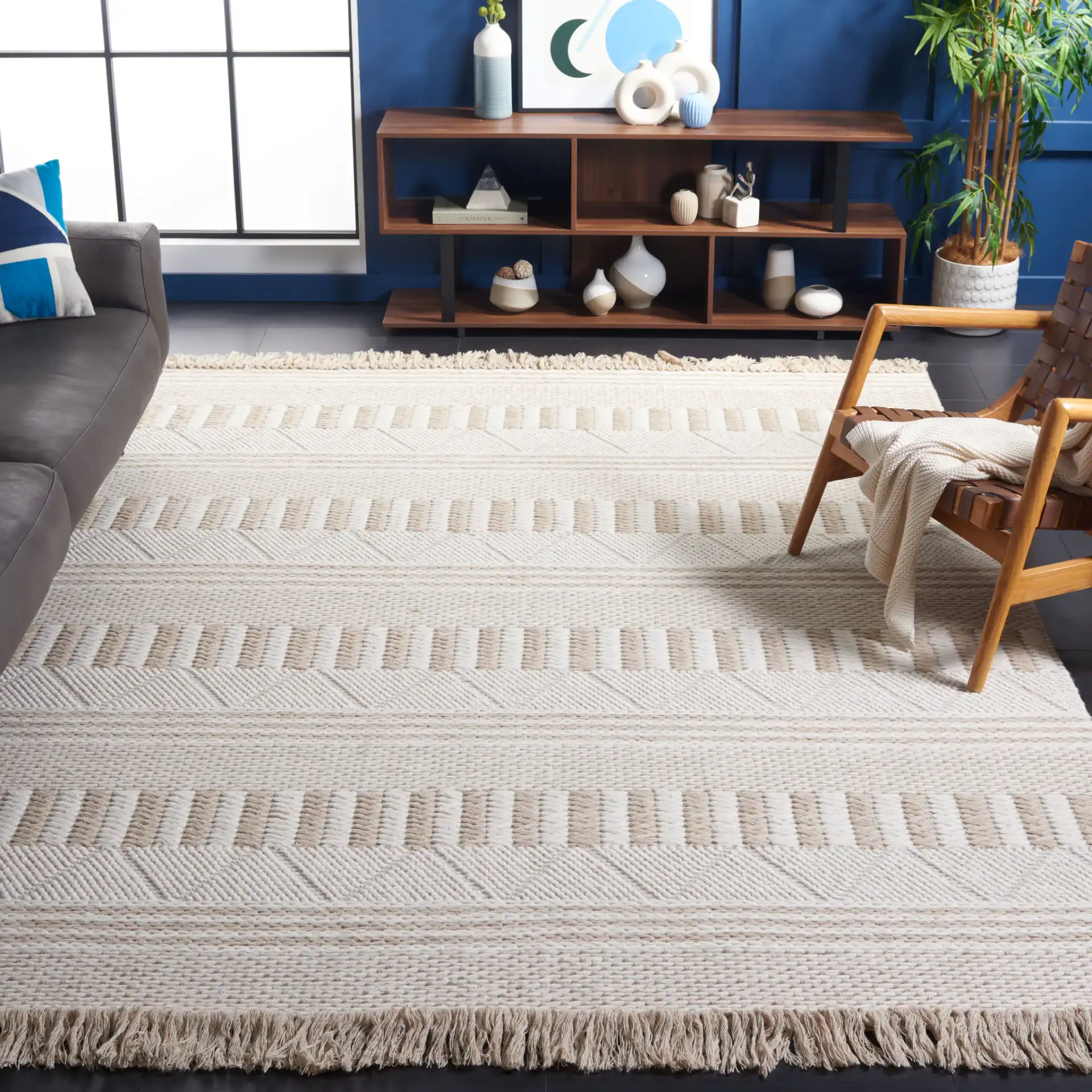 Natura Banded Stripe Hand-Woven Wool Rug in Ivory / Taupe in a styled room