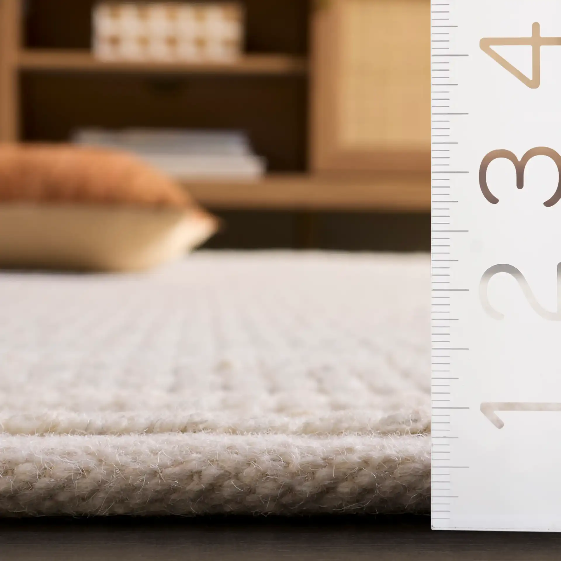 Natura Ribbed Hand-Loomed Wool Rug in Silver in a styled room
