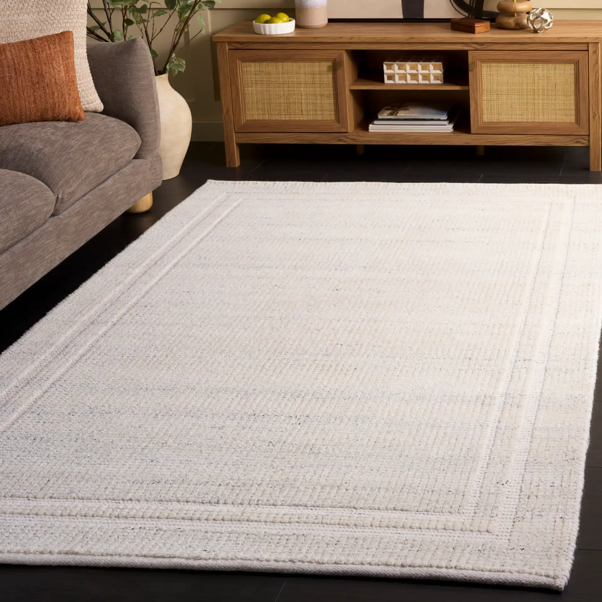 Natura Ribbed Hand-Loomed Wool Rug in Silver in a styled room
