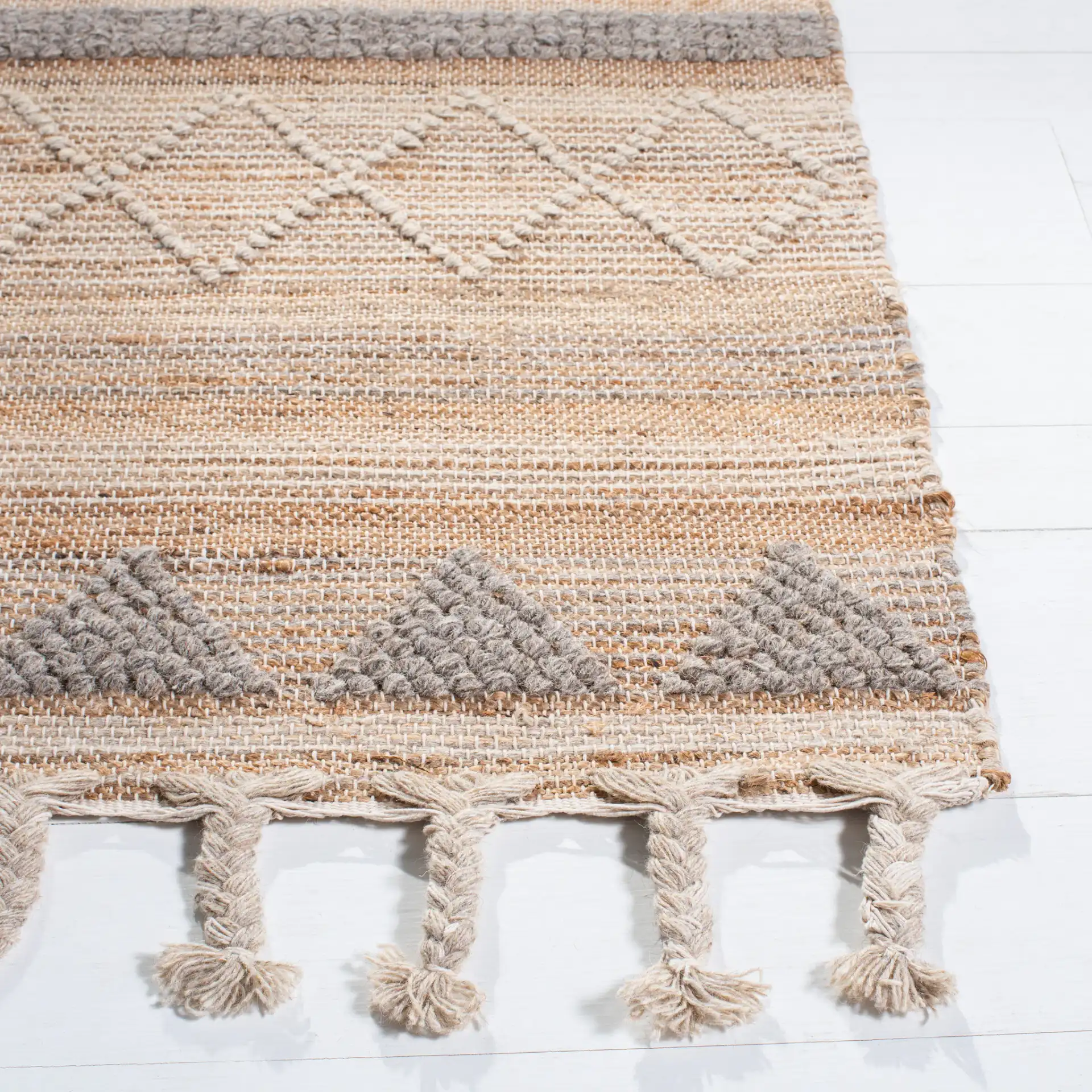 Natura Banded Triangle Flatweave Rug in Natural / Beige in a styled room