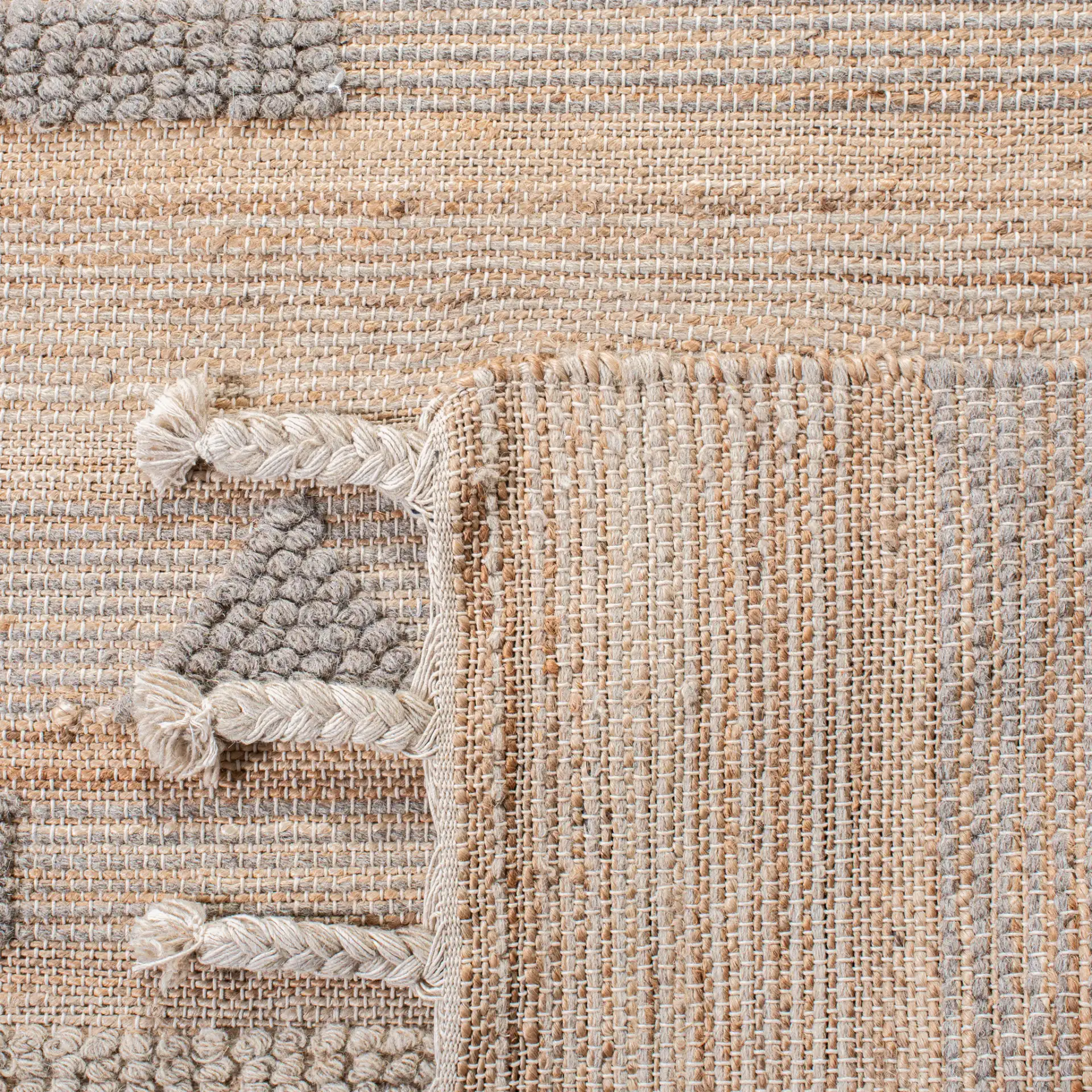 Natura Banded Triangle Flatweave Rug in Natural / Beige in a styled room