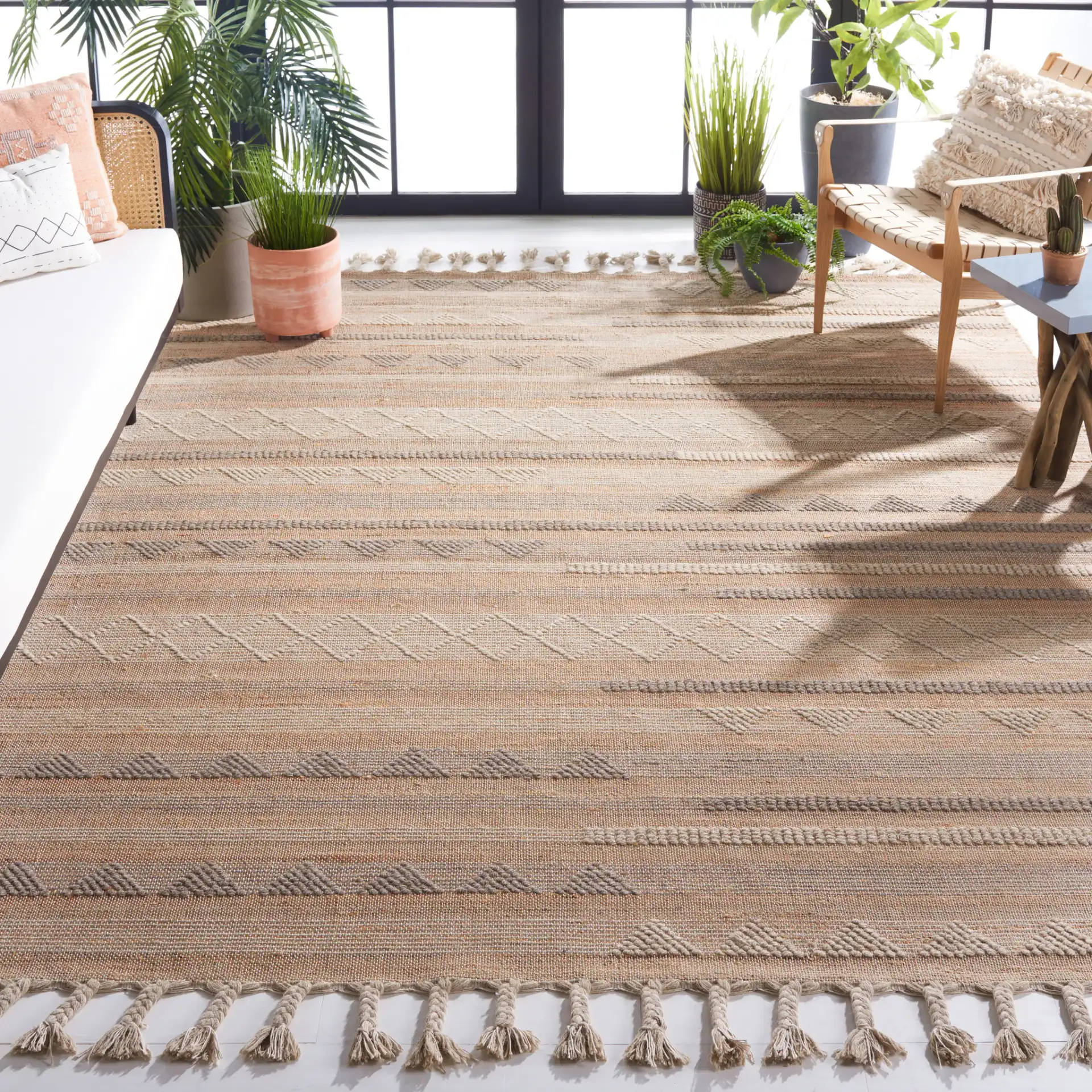 Natura Banded Triangle Flatweave Rug in Natural / Beige in a styled room