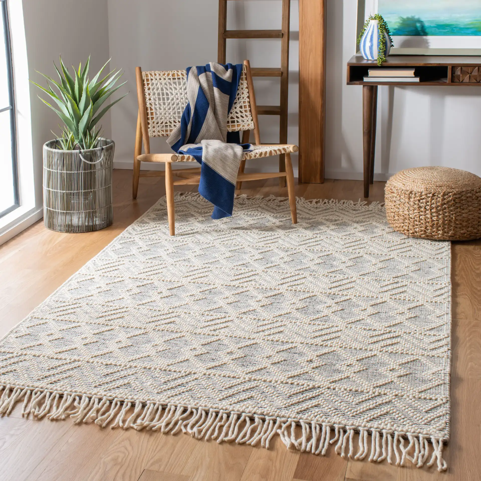 Natura Chevron And Diamond Hand-Loomed Rug in Ivory / Black in a styled room