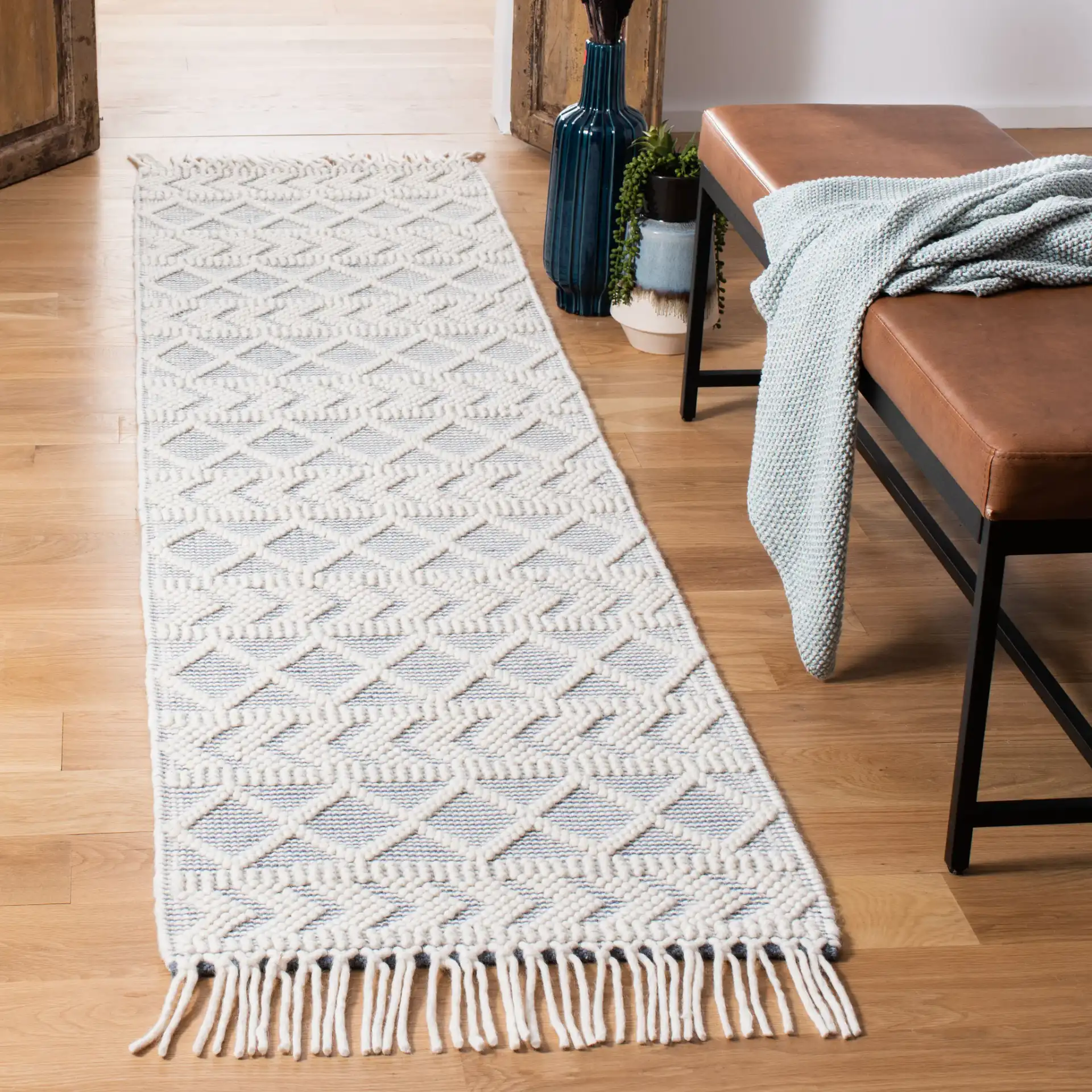 Natura Diamond And Chevron Hand-Loomed Rug in Blue / Ivory in a styled room