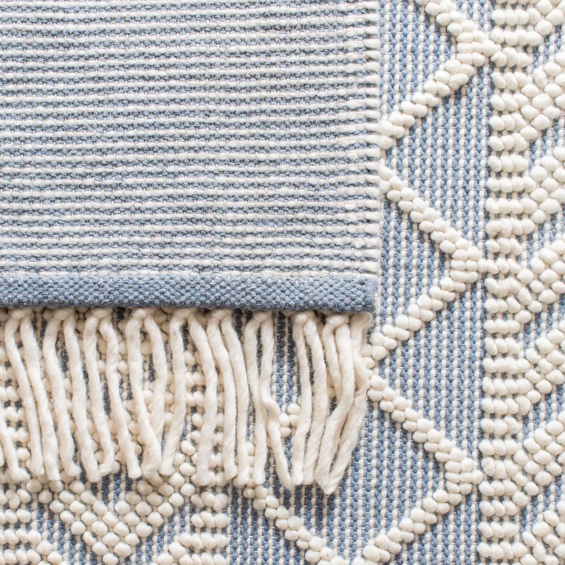 Natura Diamond And Chevron Hand-Loomed Rug in Blue / Ivory in a styled room