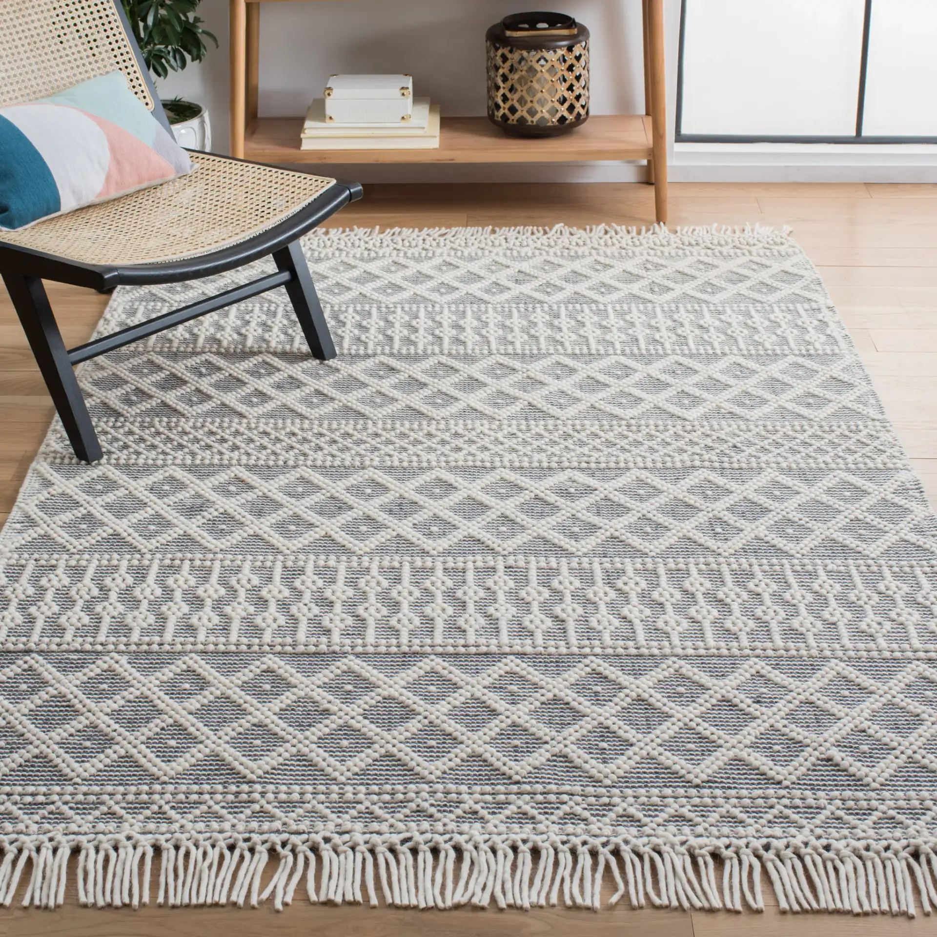 Natura Banded Trellis Diamond Hand-Loomed Wool Rug in Ivory / Gray in a styled room