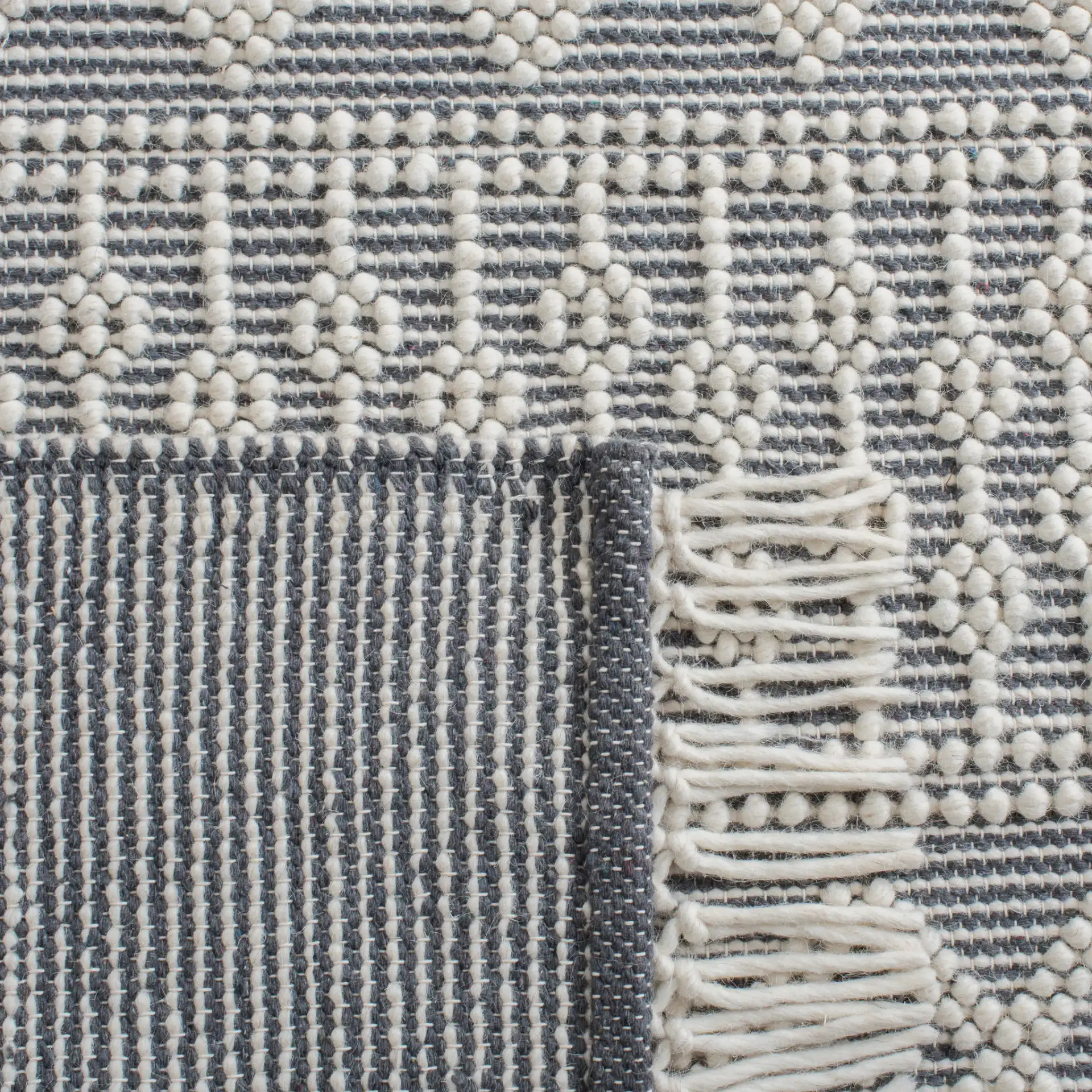 Natura Banded Trellis Diamond Hand-Loomed Wool Rug in Ivory / Gray in a styled room