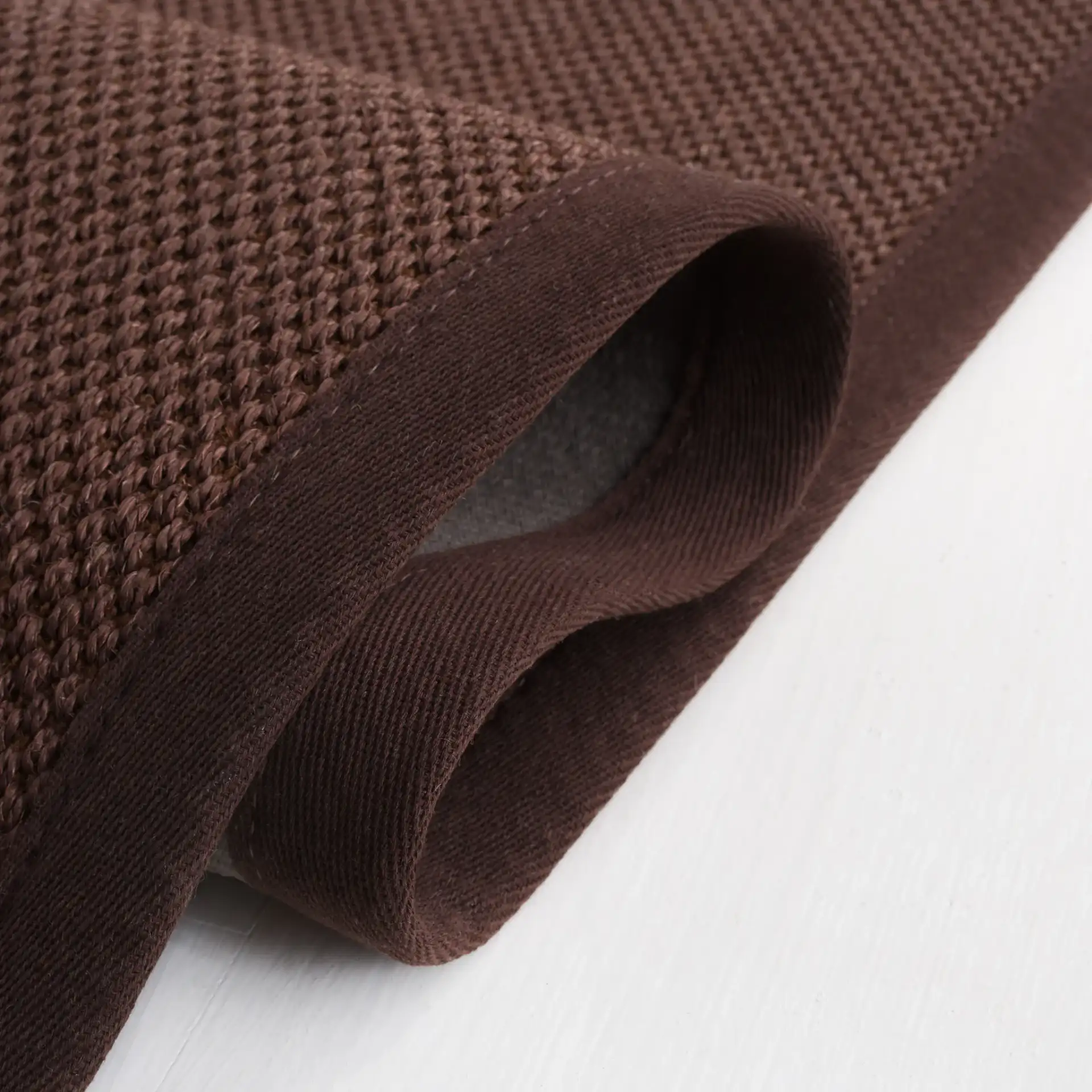 Natural Fiber Bordered Boucle Grid Sisal Rug in Chocolate / Dark Brown in a styled room