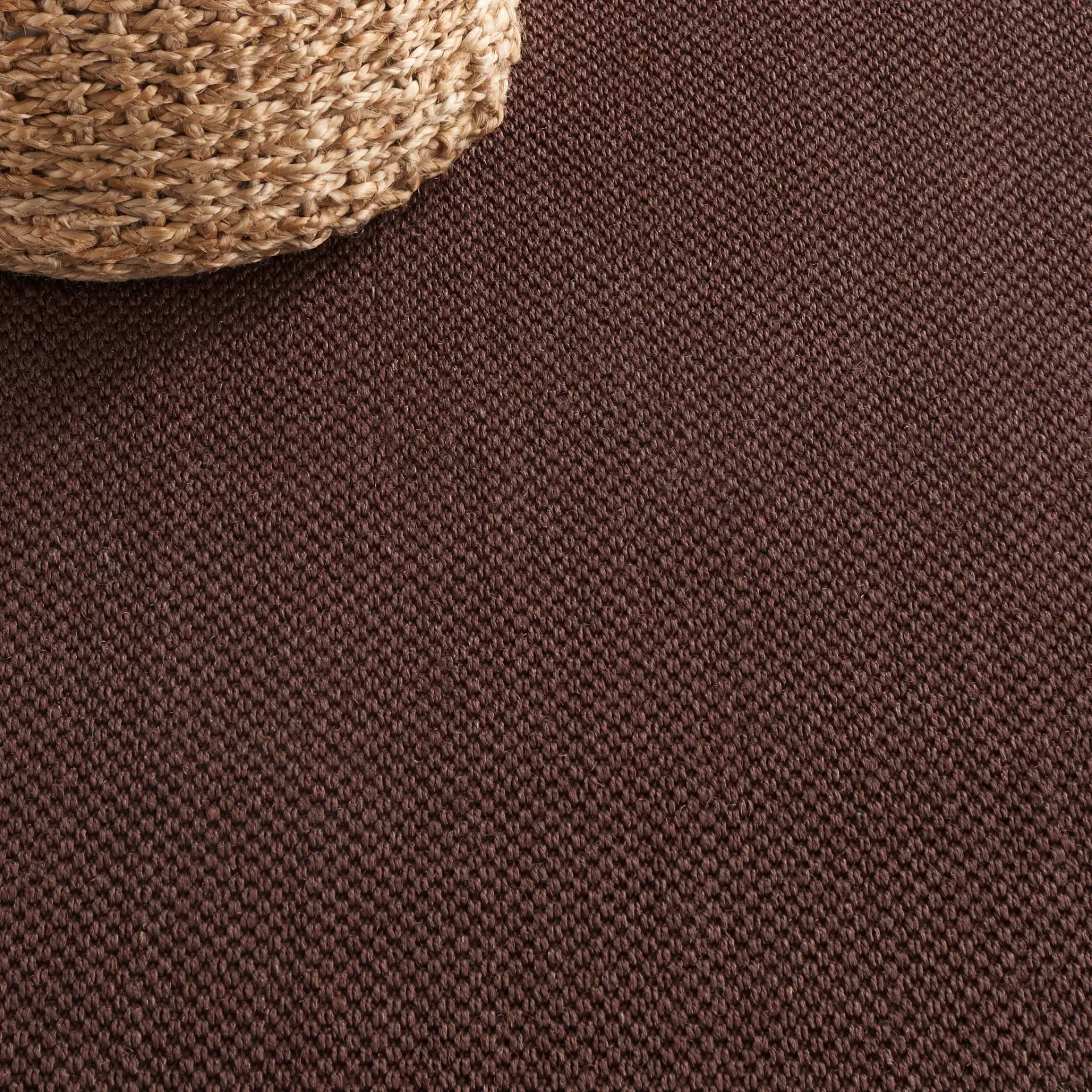 Natural Fiber Bordered Boucle Grid Sisal Rug in Chocolate / Dark Brown in a styled room