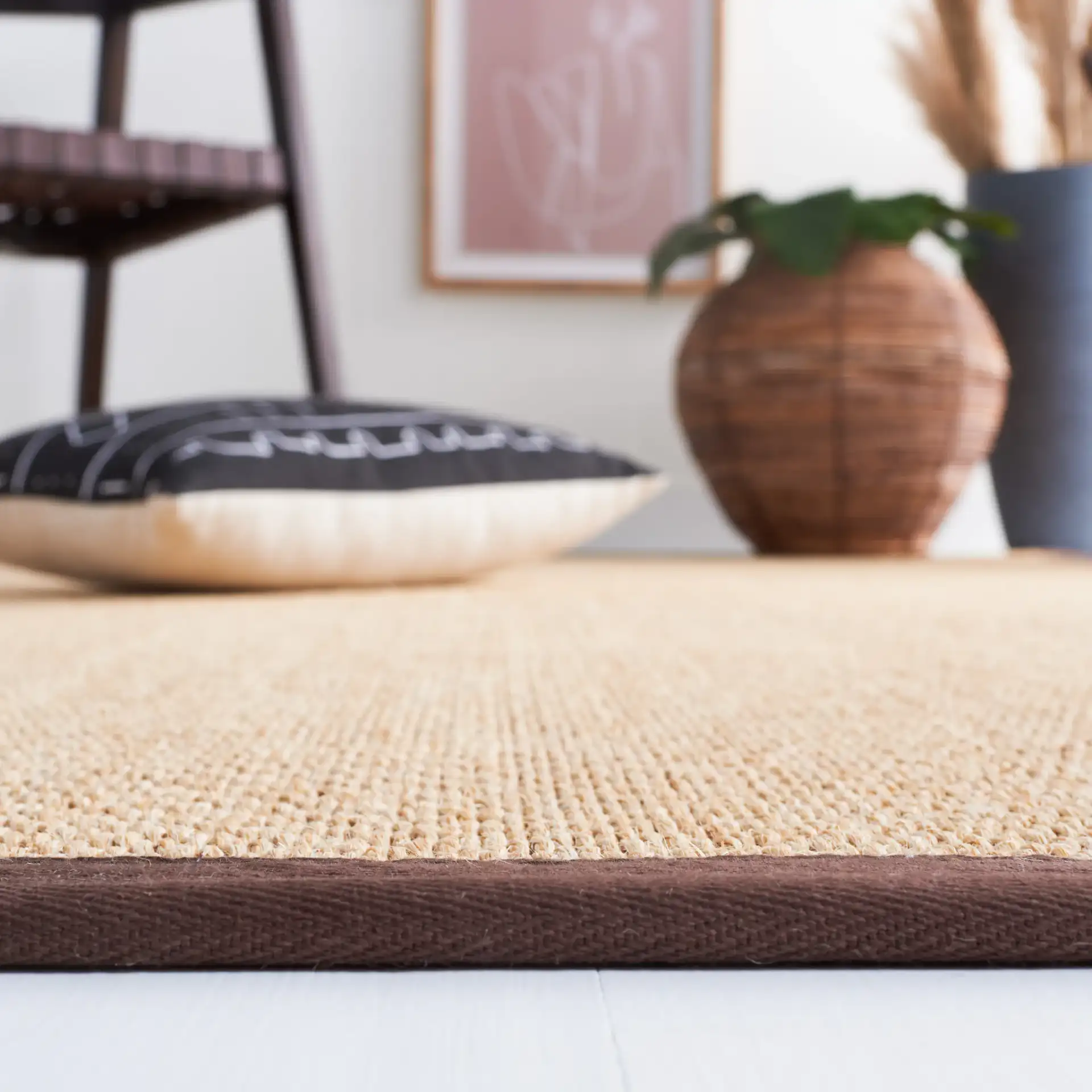 Natural Fiber Trinidad Bordered Sisal Rug in Maize / Brown in a styled room