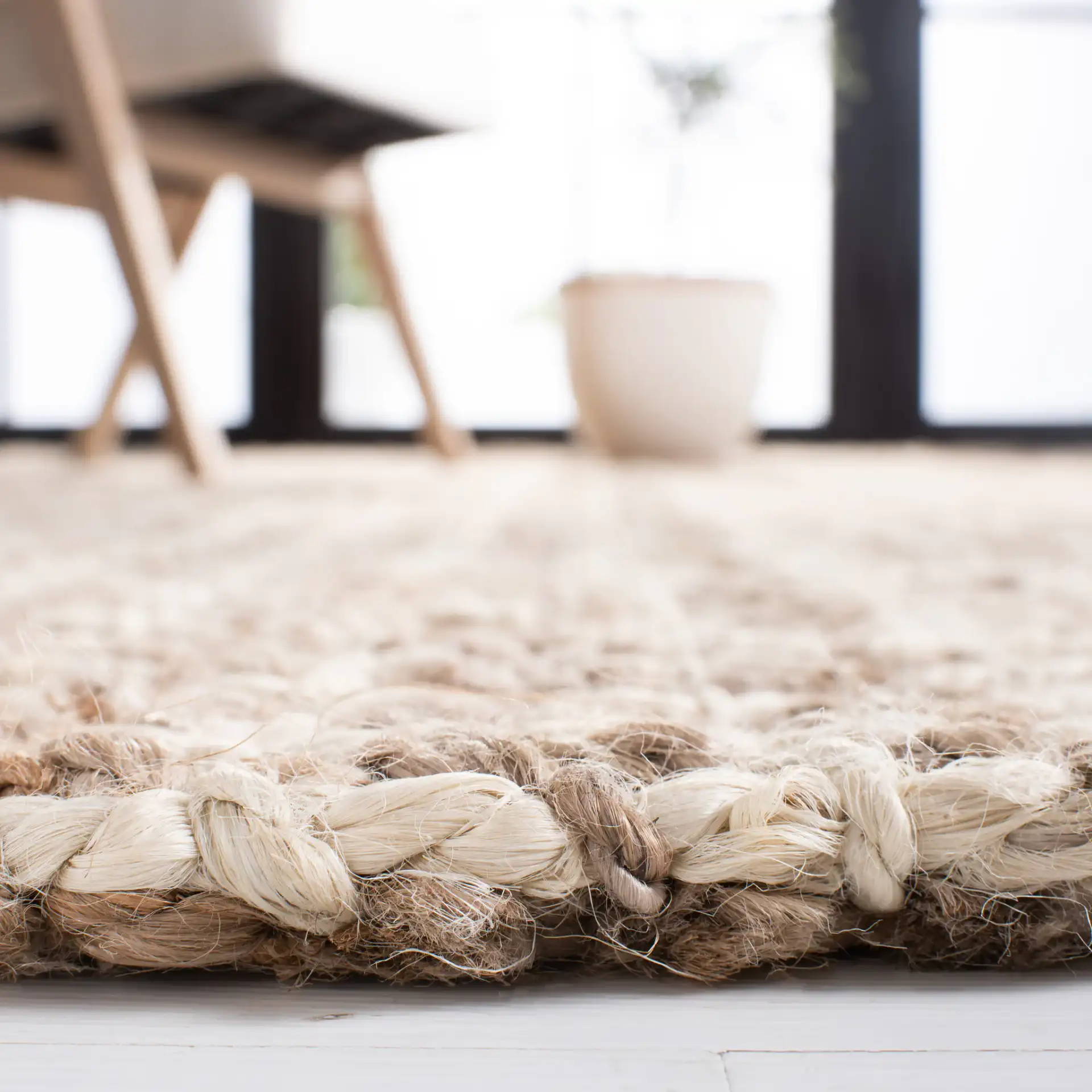 Natural Fiber Crosshatch Check Hand-Loomed Jute Rug in Natural in a styled room