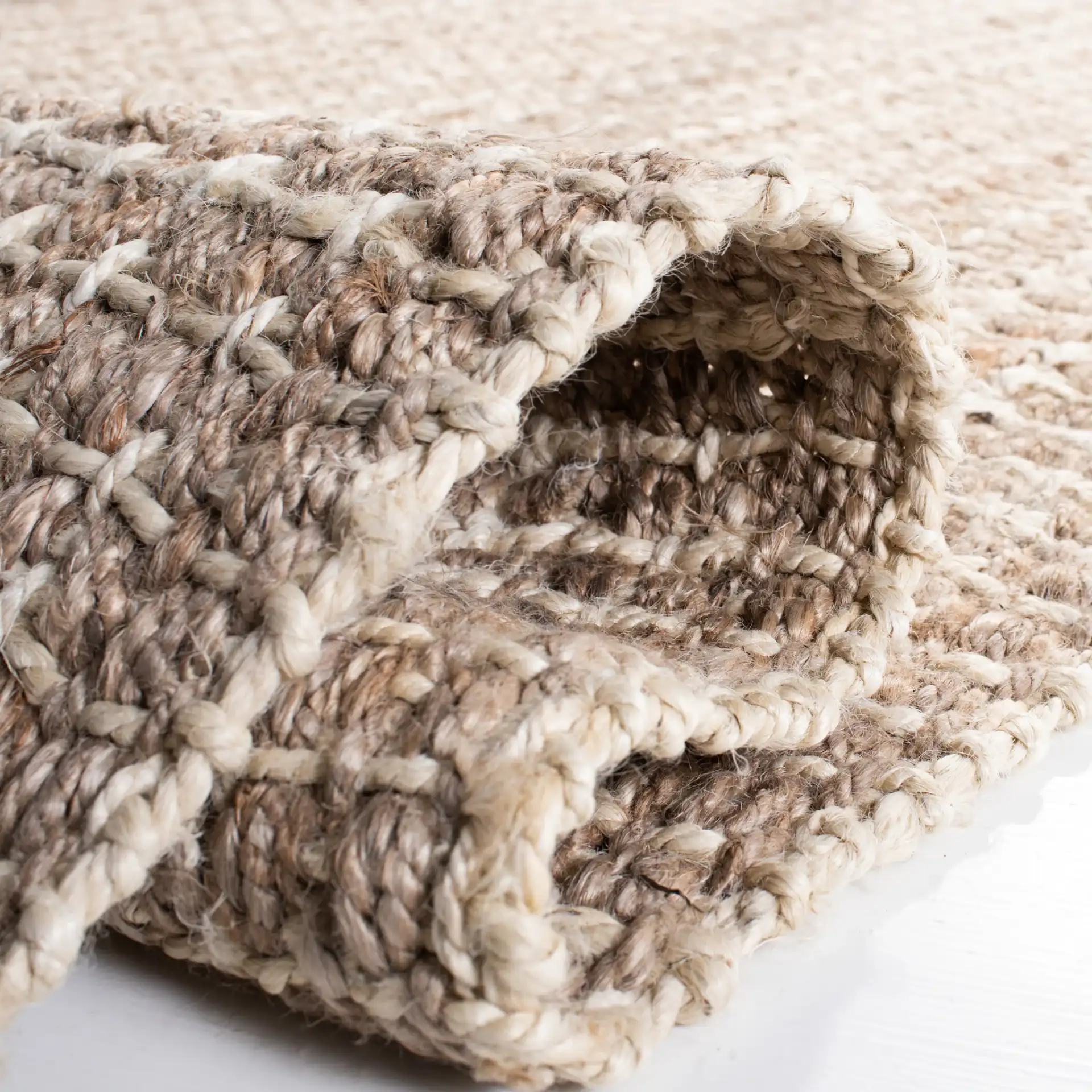 Natural Fiber Crosshatch Check Hand-Loomed Jute Rug in Natural in a styled room