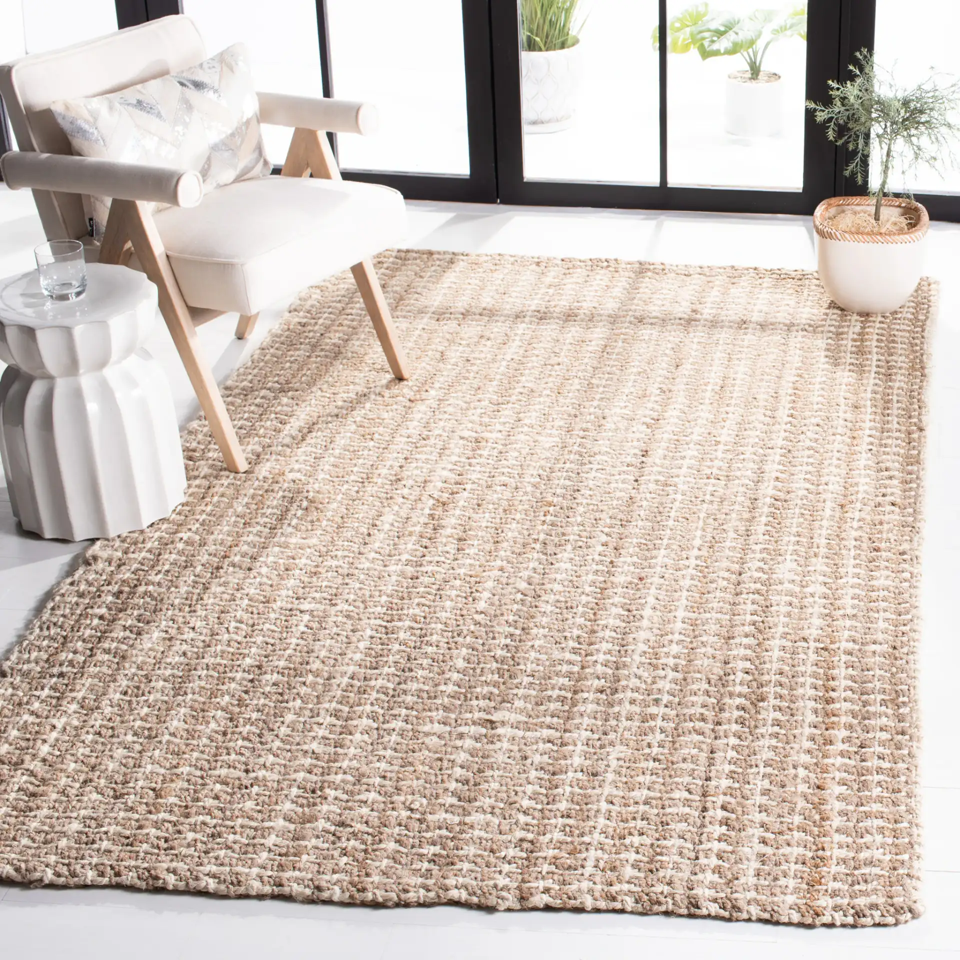 Natural Fiber Crosshatch Check Hand-Loomed Jute Rug in Natural in a styled room