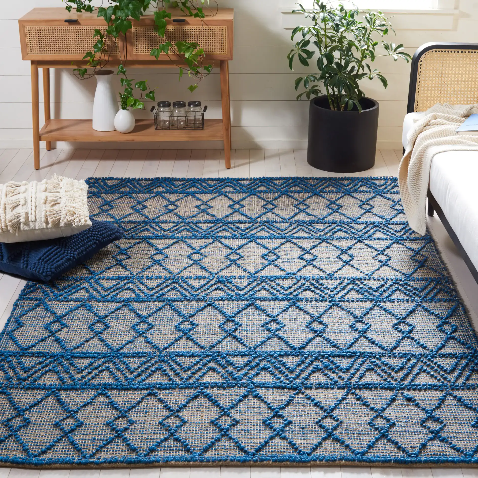Natural Fiber Banded Chevron Flatweave Jute Rug in Blue / Natural in a styled room