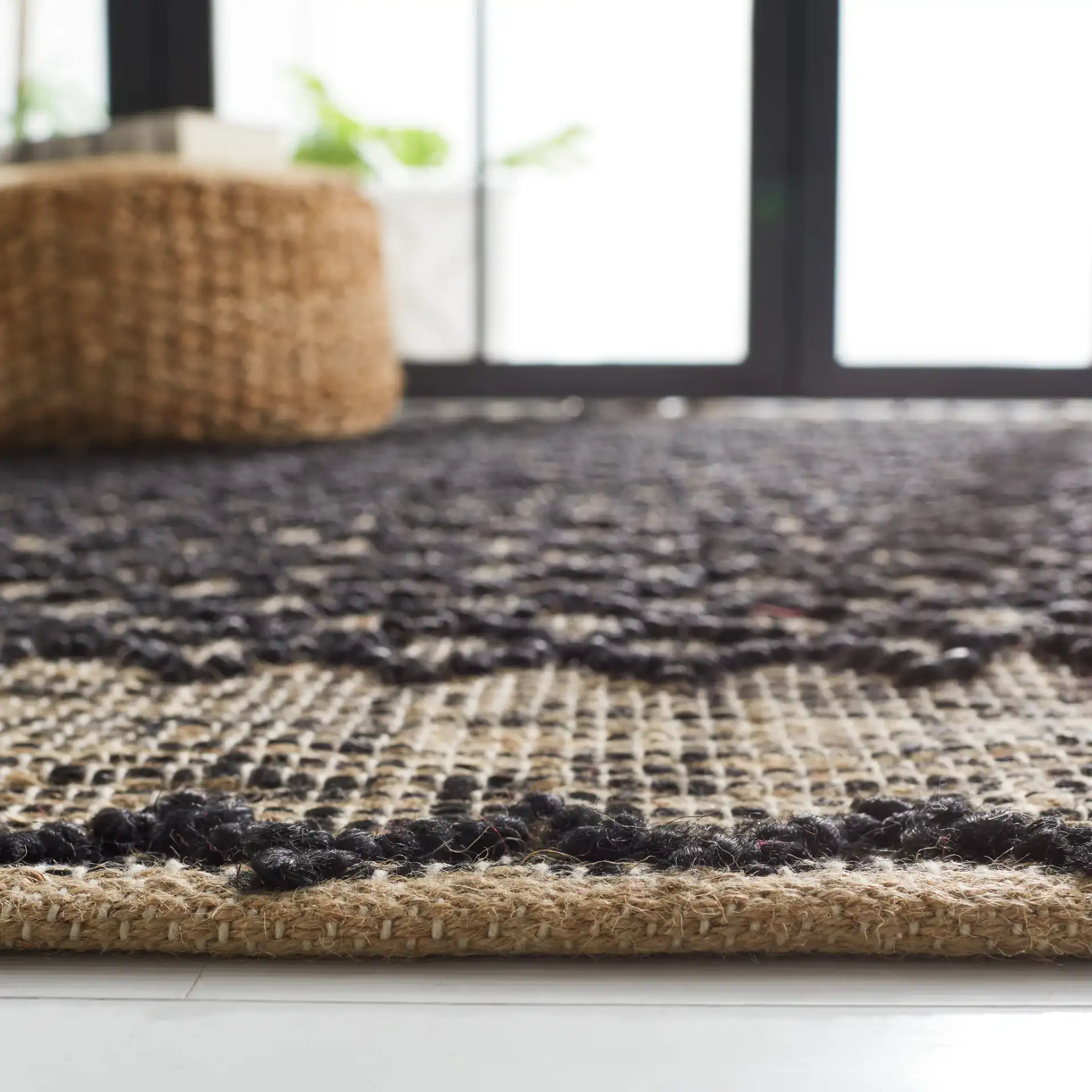 Natural Fiber Diamond Grid Flatweave Jute Rug in Black / Natural in a styled room