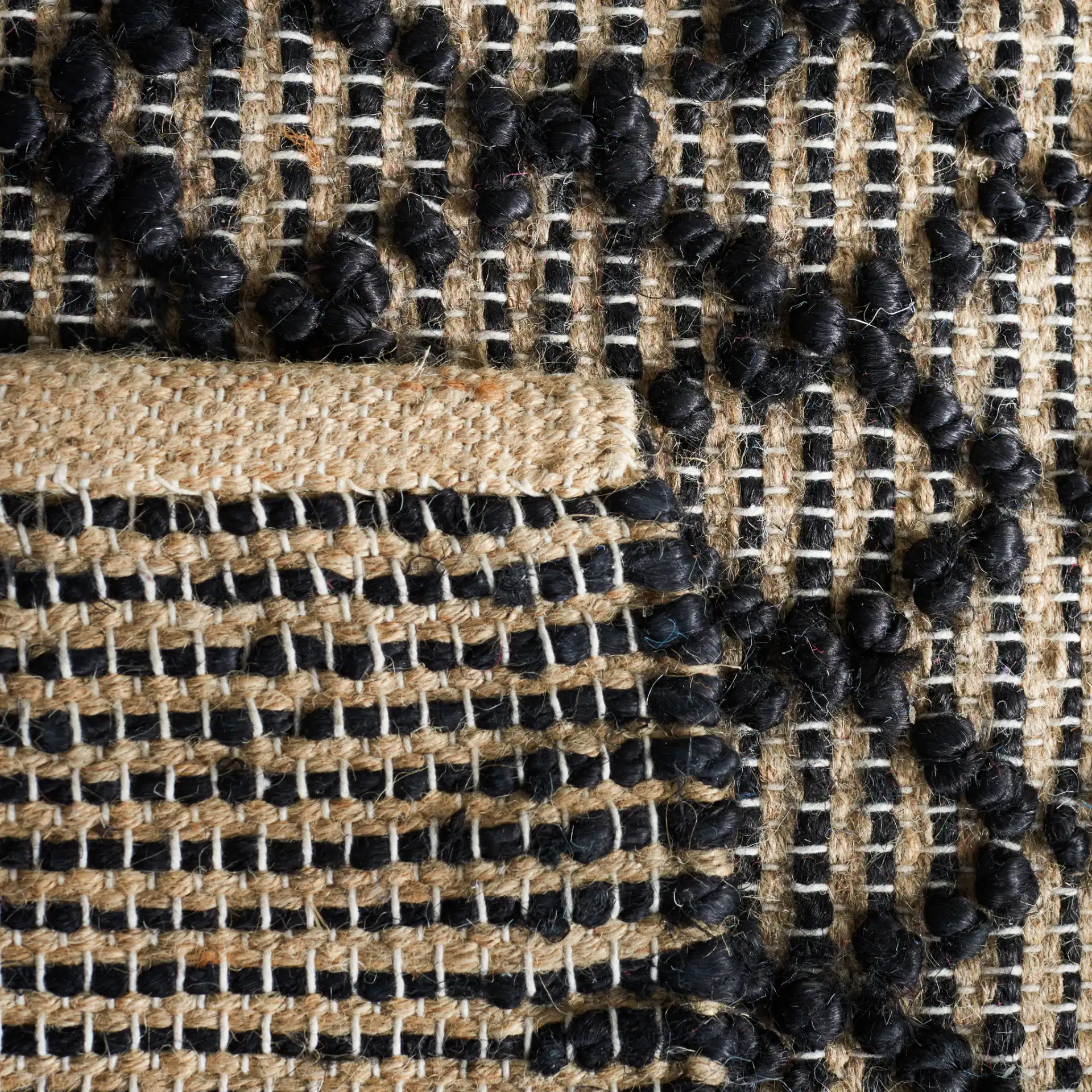Natural Fiber Diamond Grid Flatweave Jute Rug in Black / Natural in a styled room