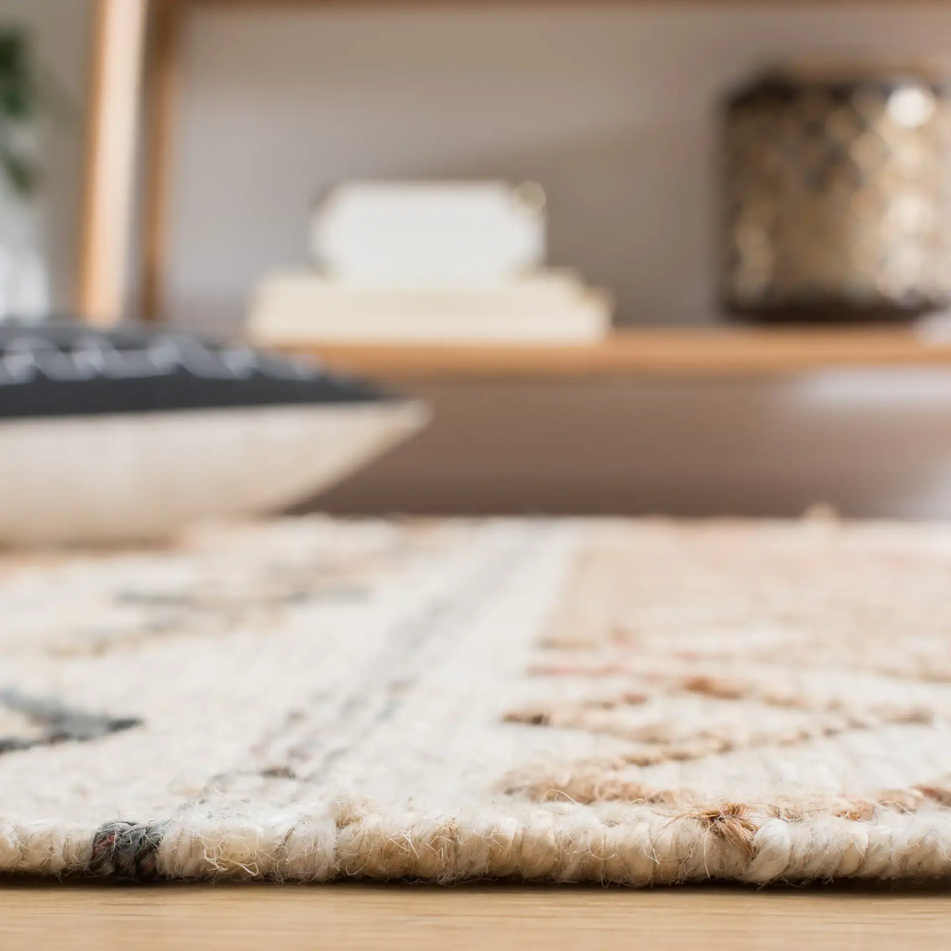 Natural Fiber Diamond Banded Hand-Loomed Jute Rug in Natural / Ivory in a styled room