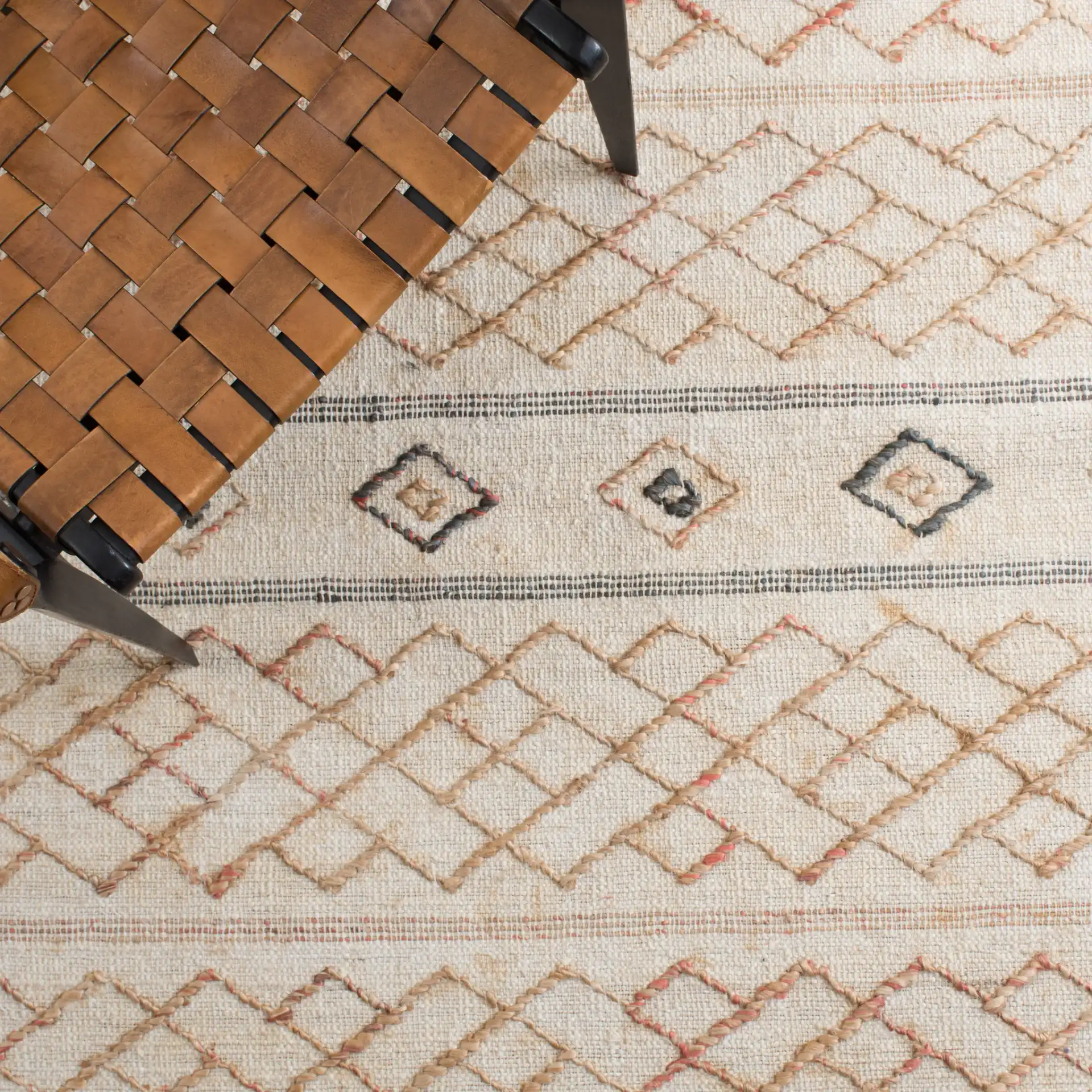Natural Fiber Diamond Banded Hand-Loomed Jute Rug in Natural / Ivory in a styled room