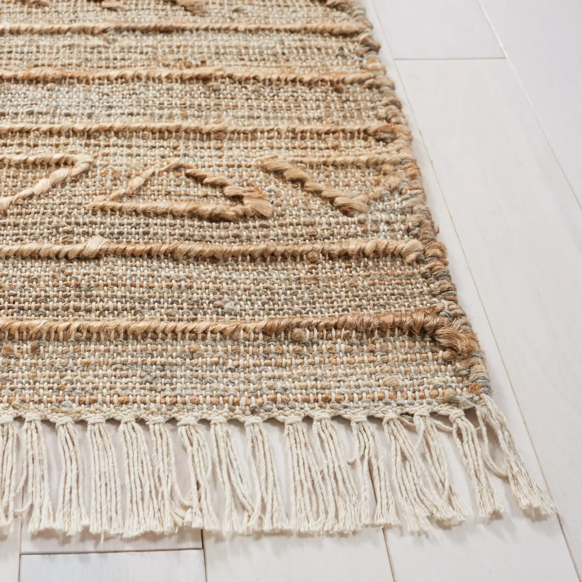 Natural Fiber Banded Chevron Hand-Loomed Jute Rug in Natural in a styled room