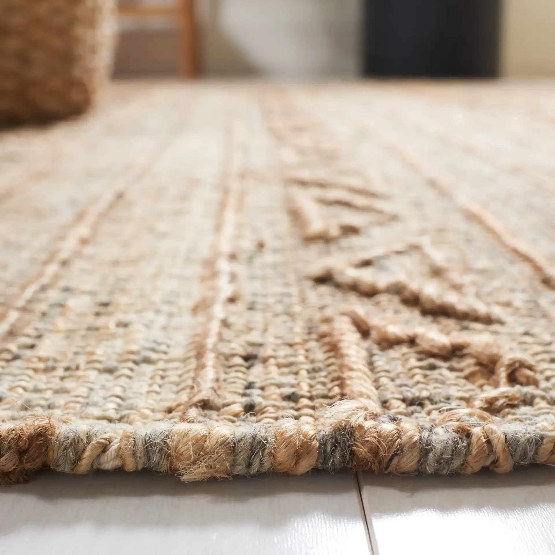 Natural Fiber Banded Chevron Hand-Loomed Jute Rug in Natural in a styled room