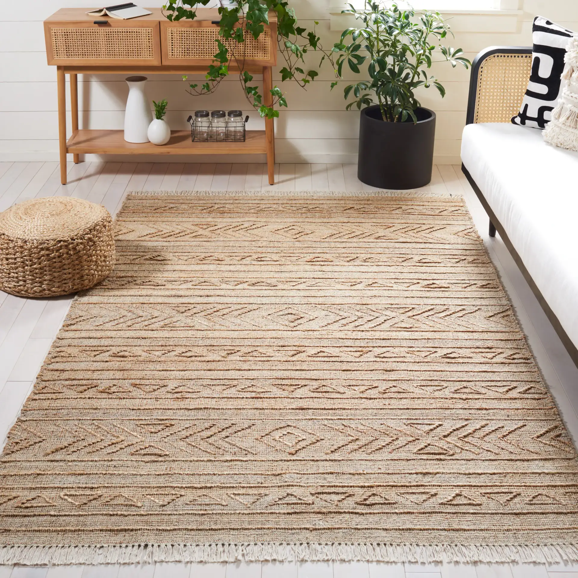 Natural Fiber Banded Chevron Hand-Loomed Jute Rug in Natural in a styled room