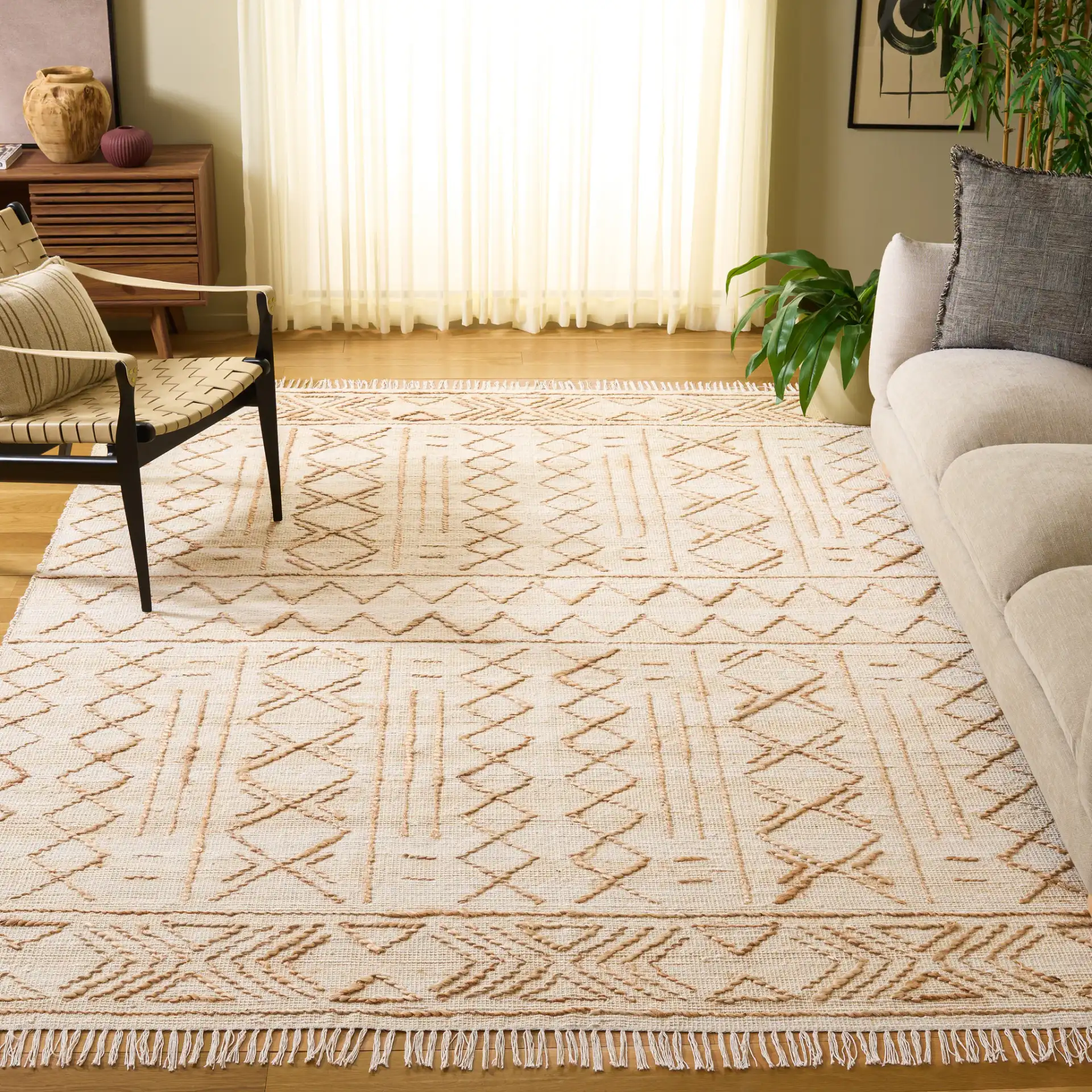 Natural Fiber Geometric Banded Hand-Loomed Jute Rug in Natural / Beige in a styled room