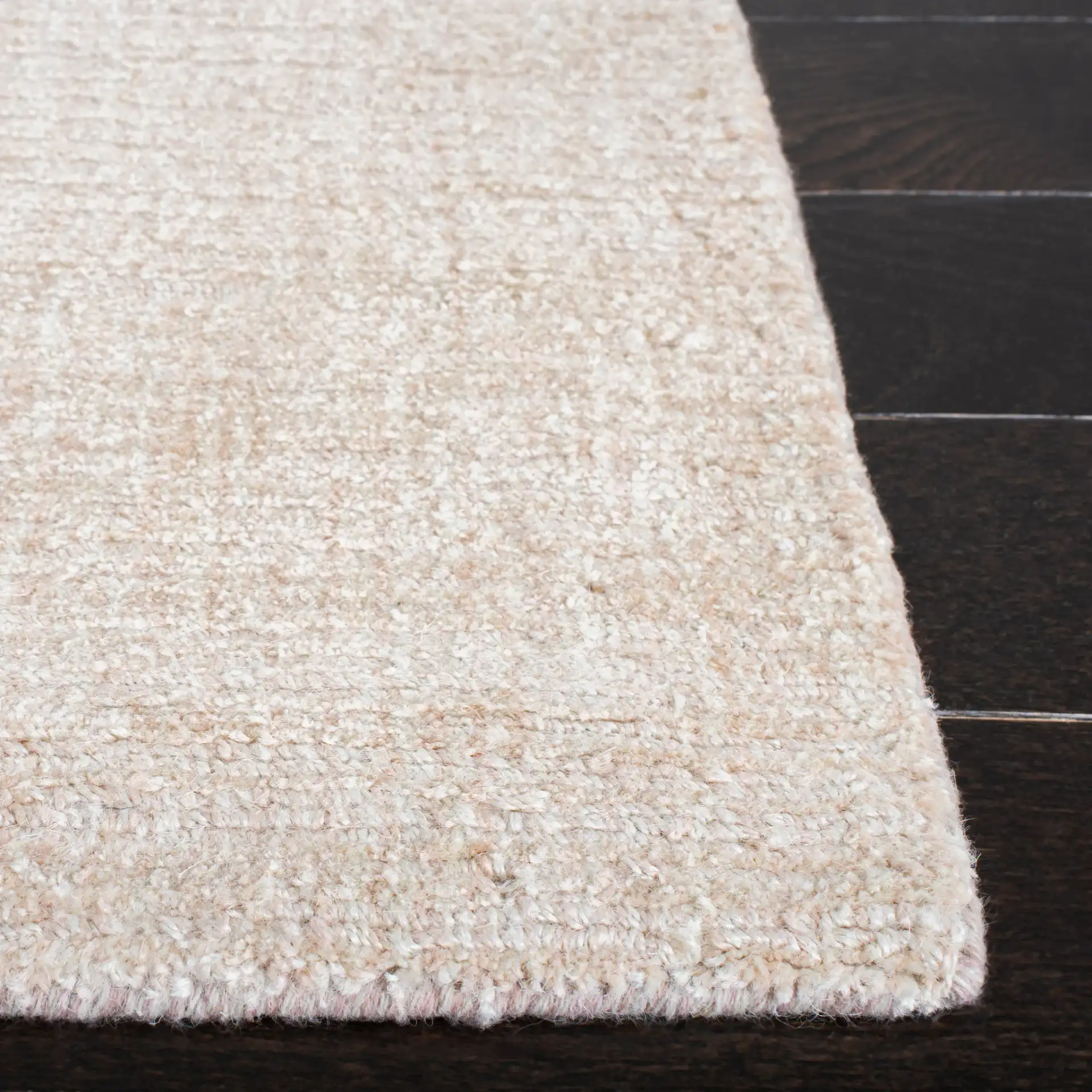 Natural Fiber Fine Ribbed Hand-Loomed Jute Rug in Light Pink in a styled room