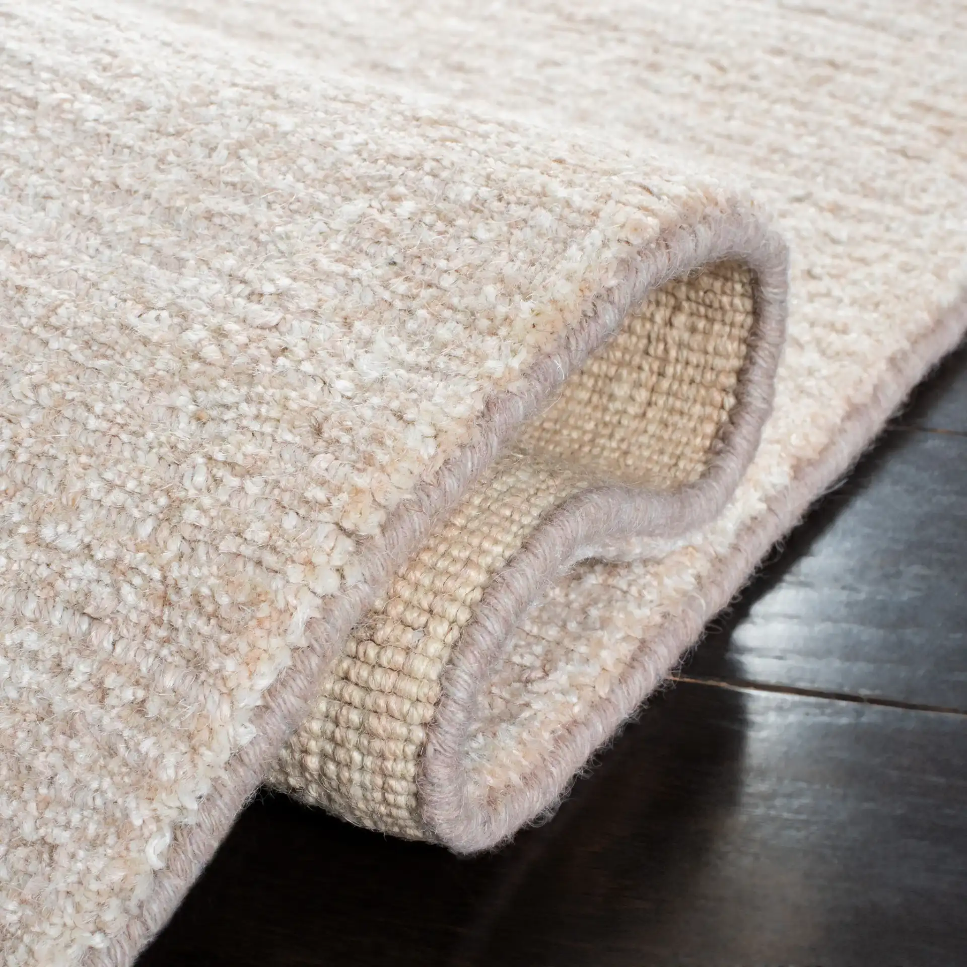 Natural Fiber Fine Ribbed Hand-Loomed Jute Rug in Light Pink in a styled room