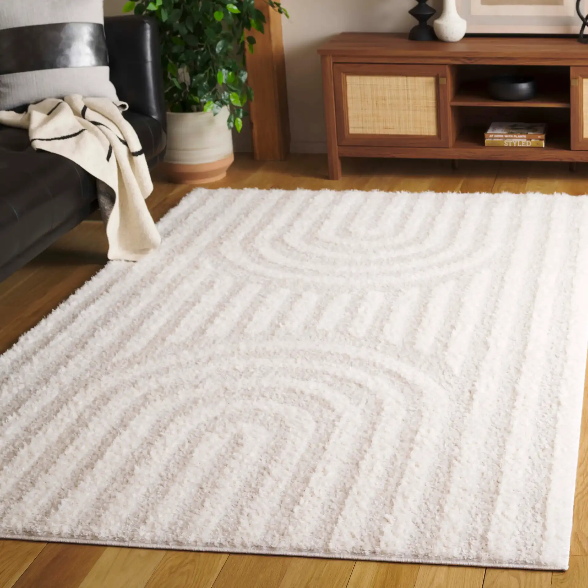 Norway Arch And Stripe Shag Rug in Ivory / Gray in a styled room